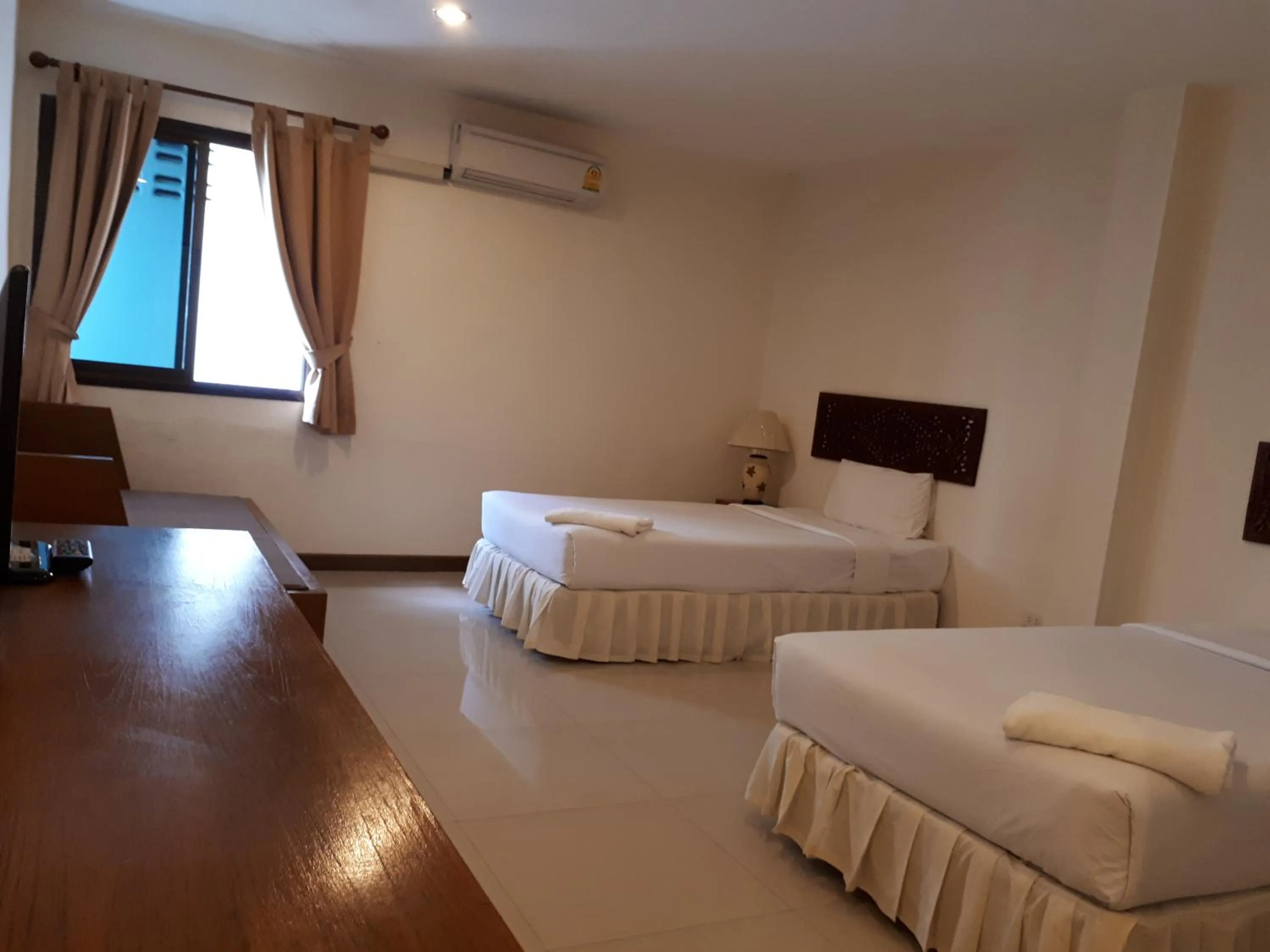 Bed in Nathon Residence Hotelโรงเเรมหน้าทอนเรสซิเด้นท์