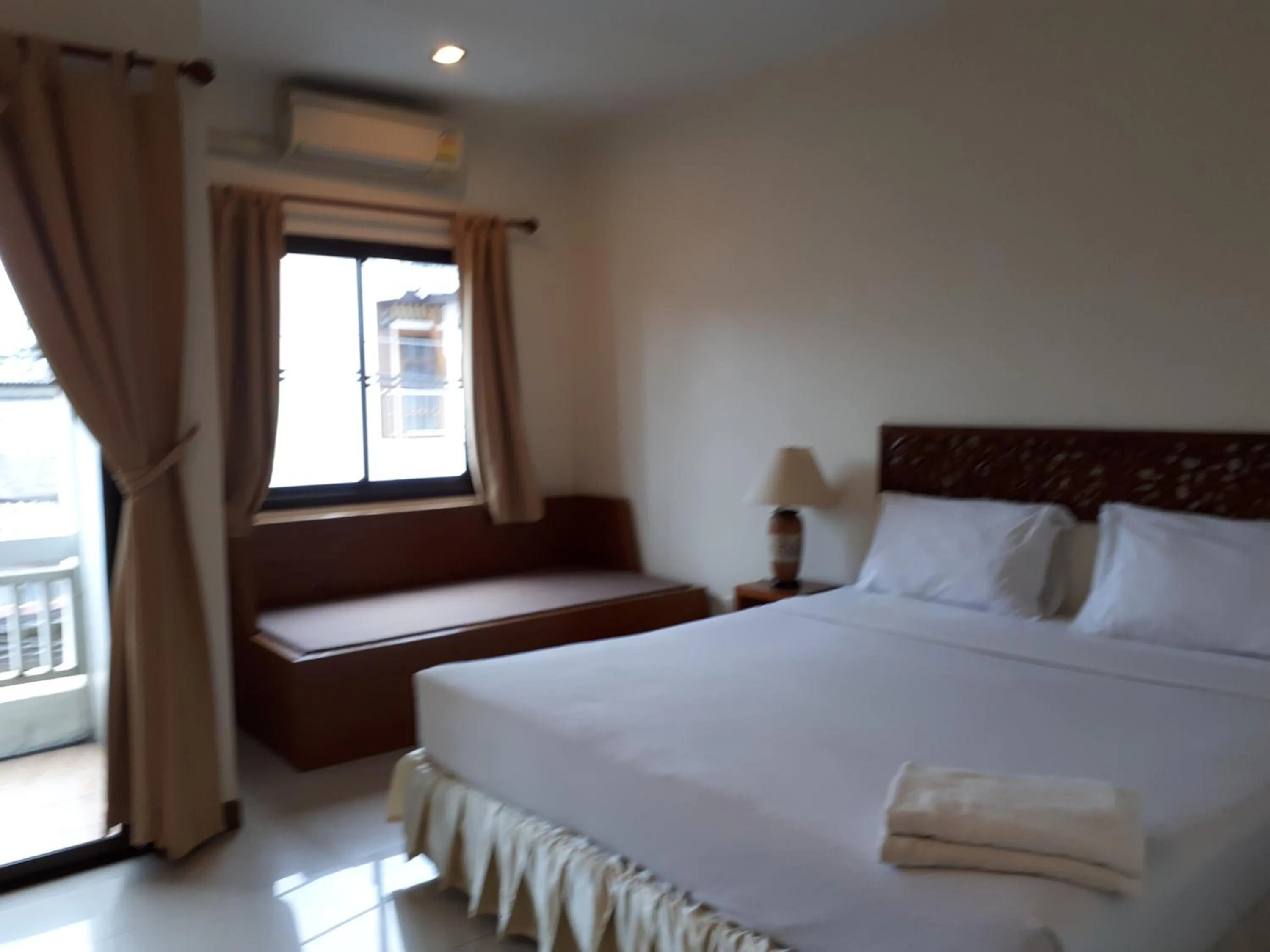 Bed in Nathon Residence Hotelโรงเเรมหน้าทอนเรสซิเด้นท์