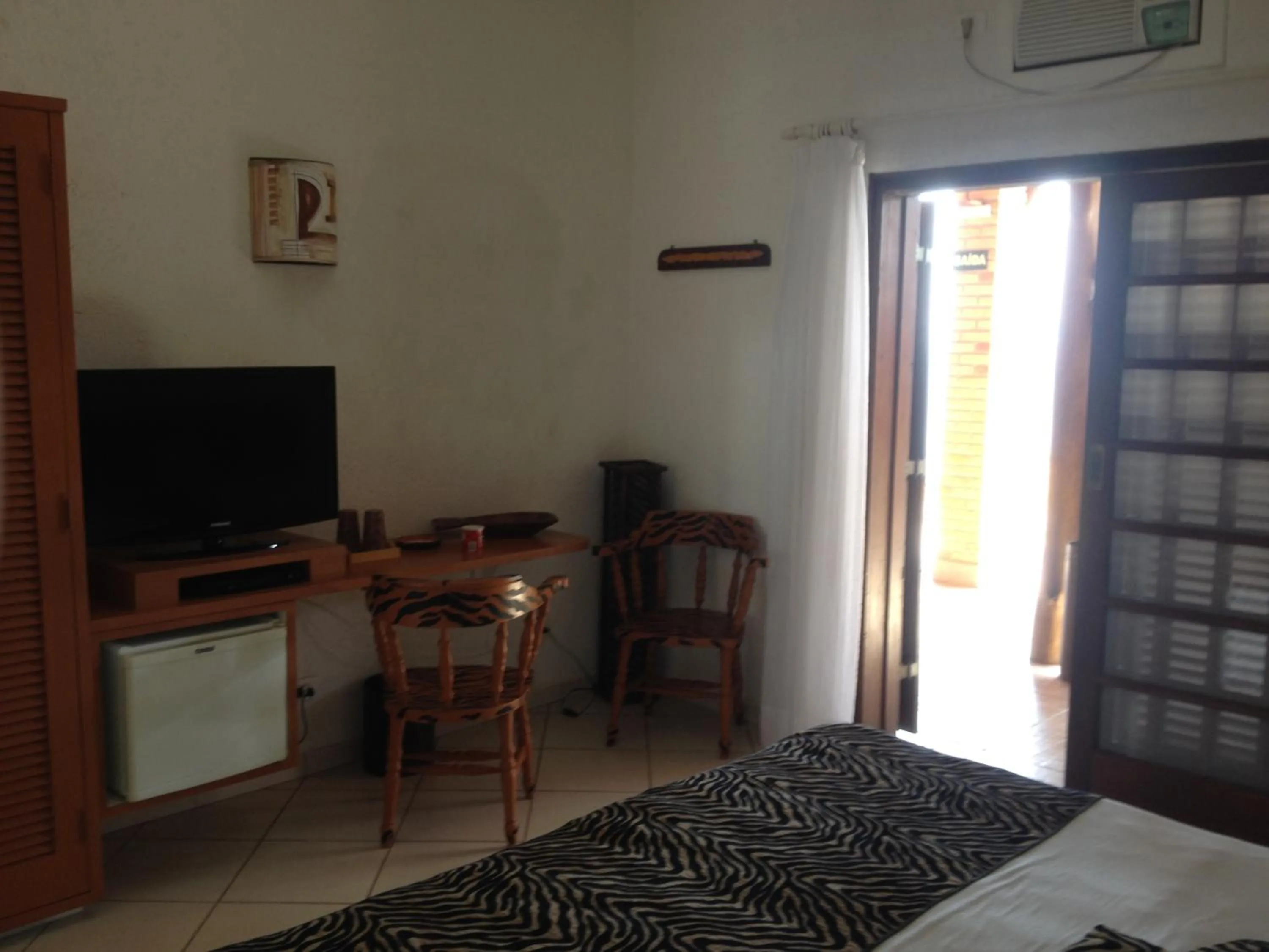 Photo of the whole room, Bed in Pousada Singuitta - Ilhabela
