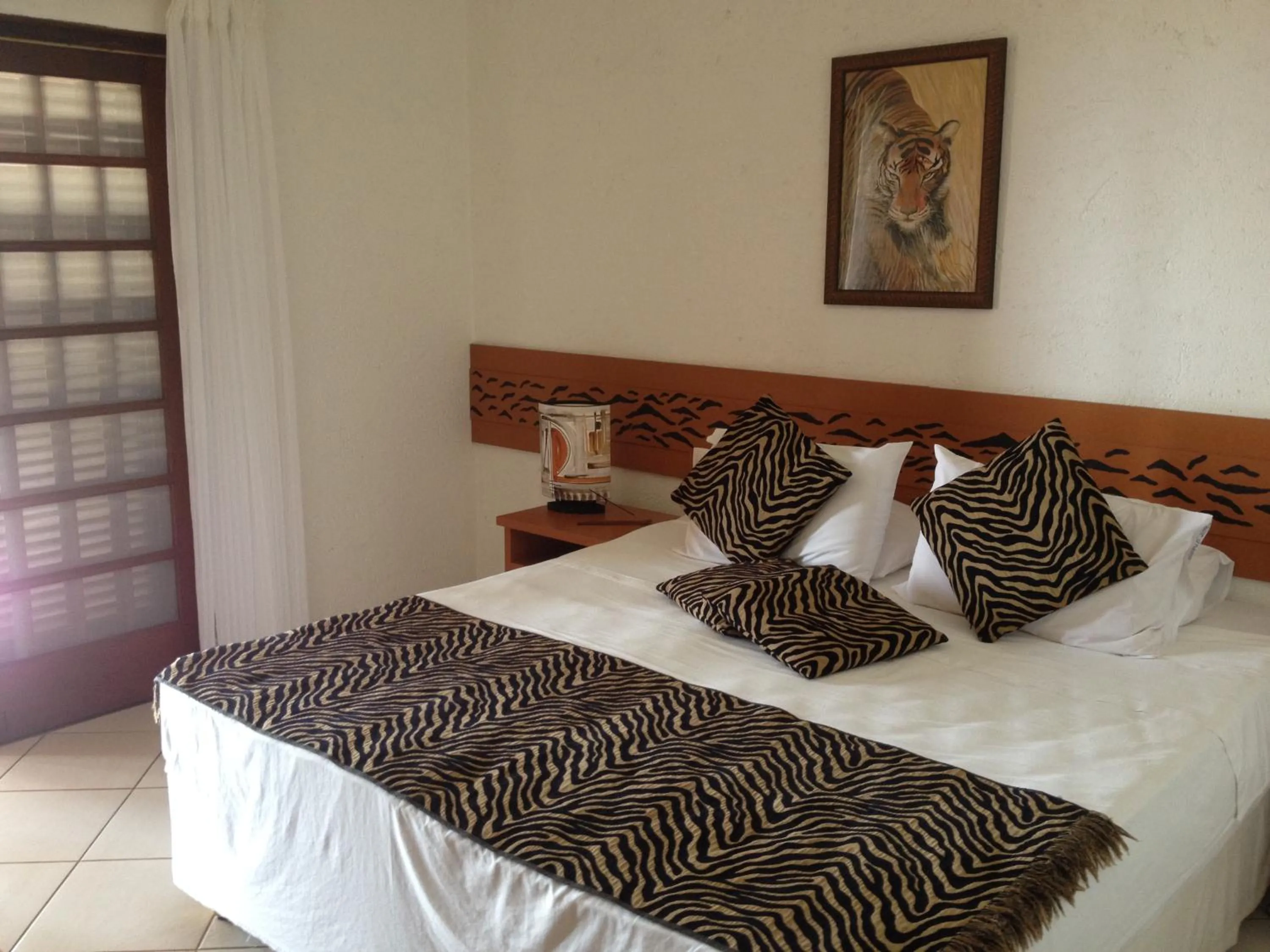 Bed in Pousada Singuitta - Ilhabela