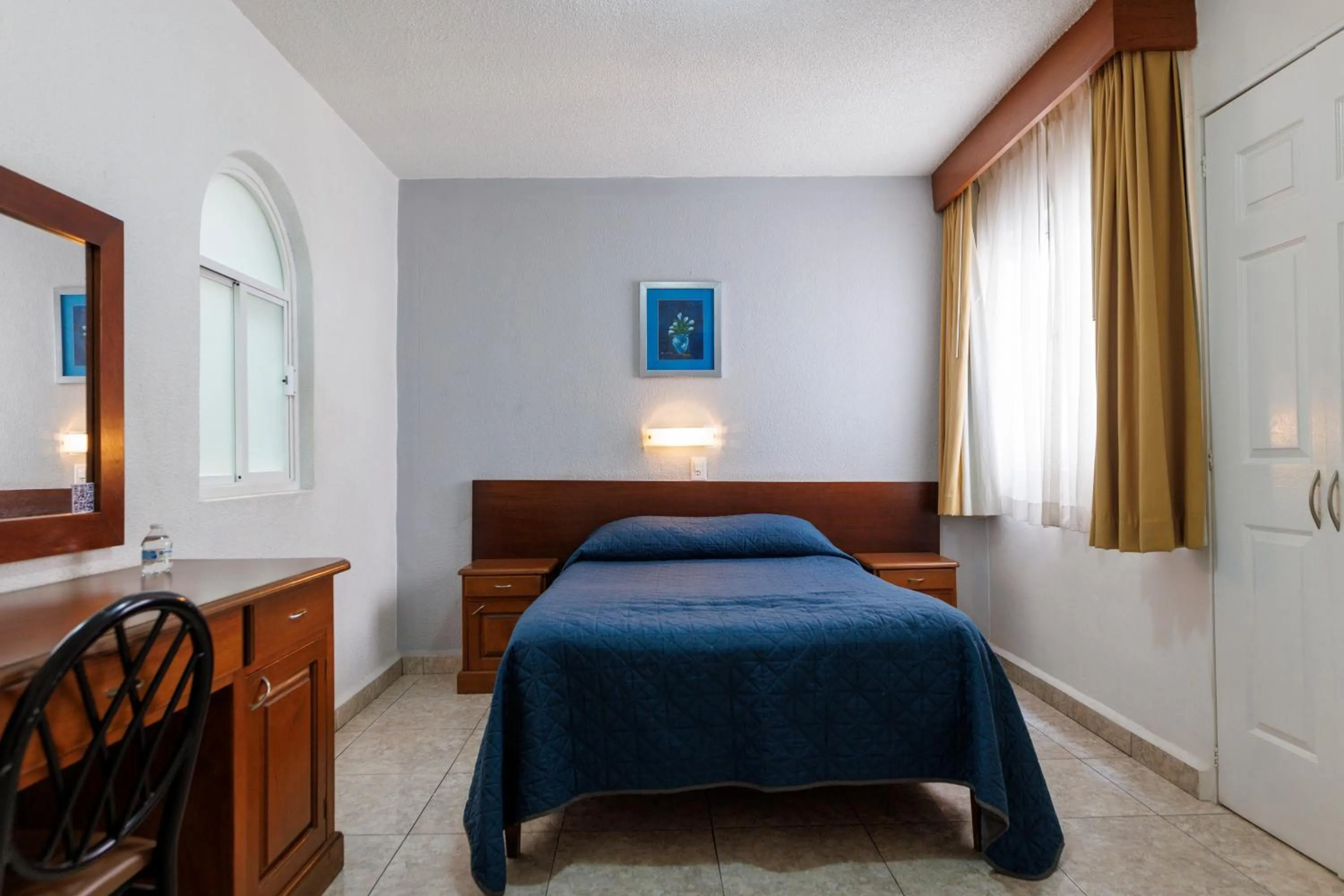 Bed in Hotel Qualitel Plus