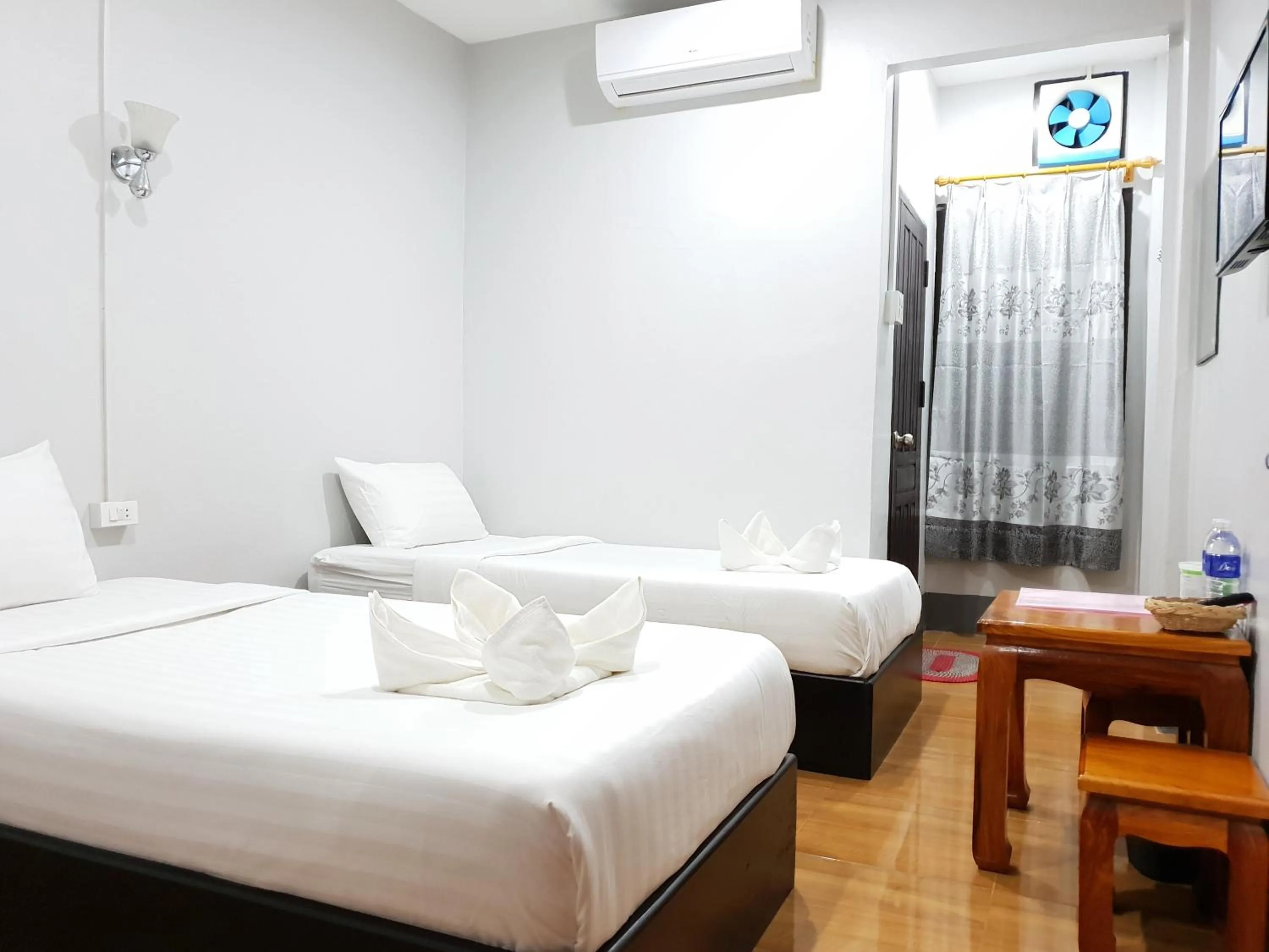 Bed in Phonethavy GUESTHOUSE