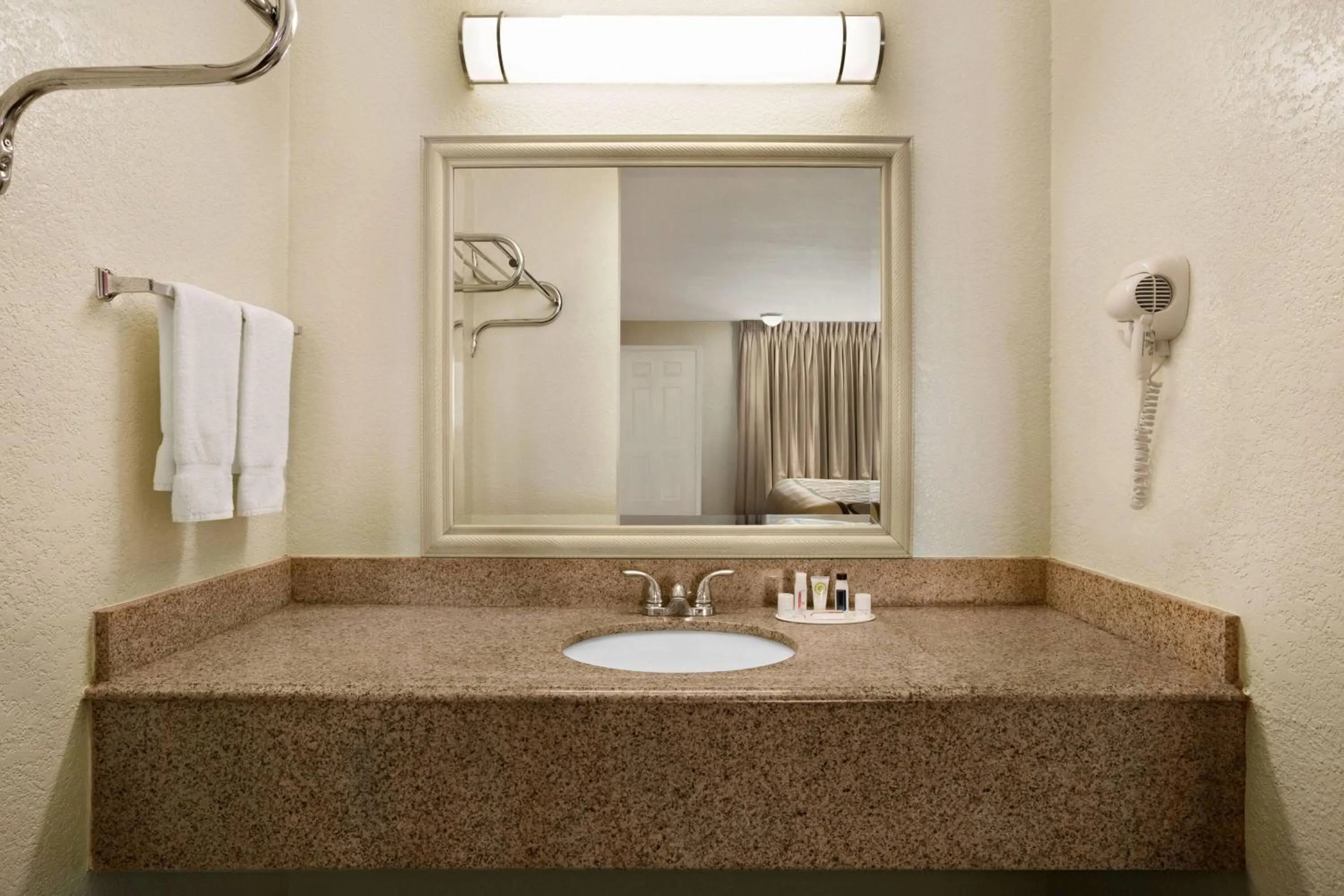 Bathroom in Super 8 by Wyndham Corsicana