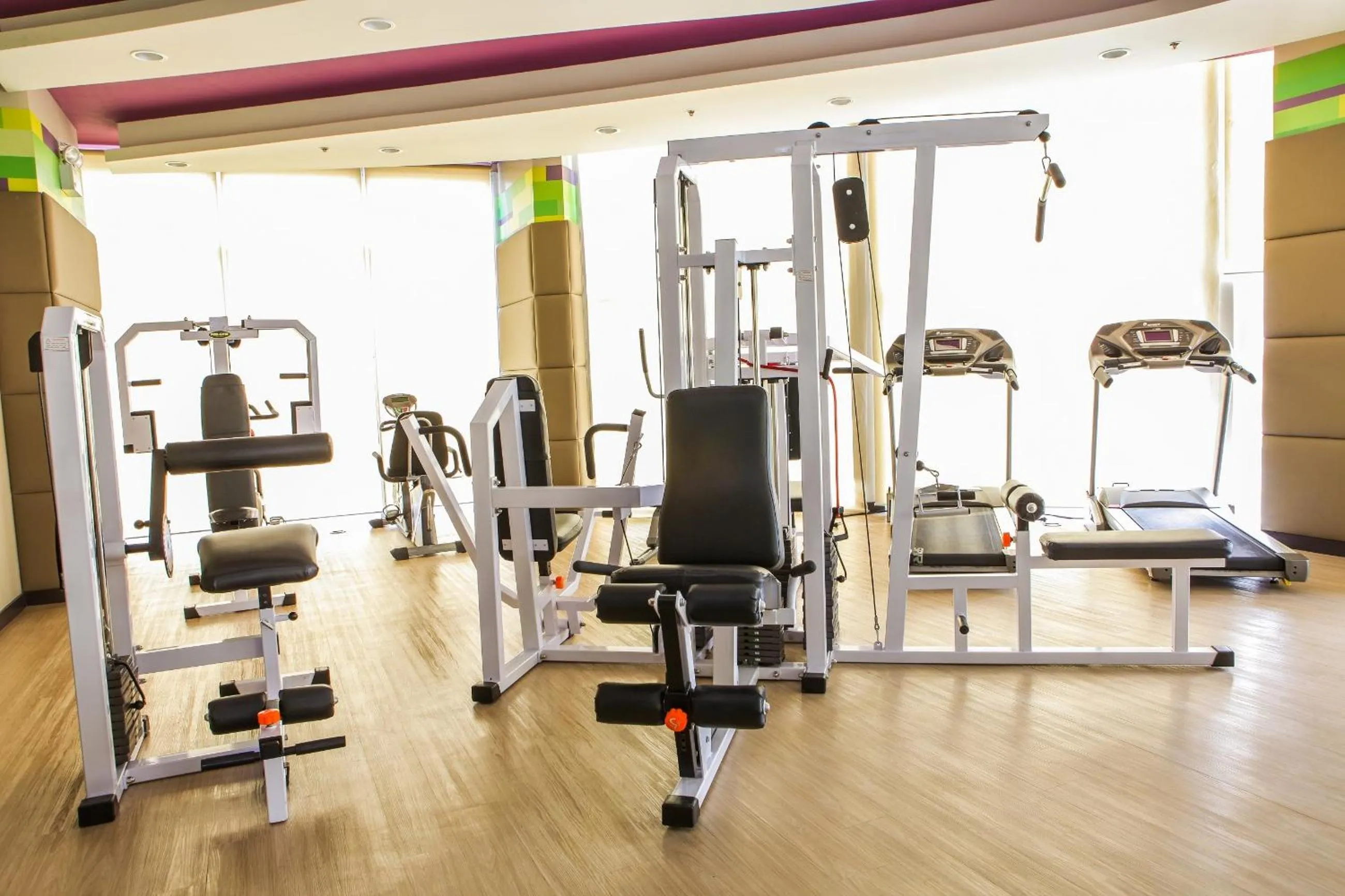 Fitness centre/facilities in The Exchange Regency Residence Hotel Managed by HII