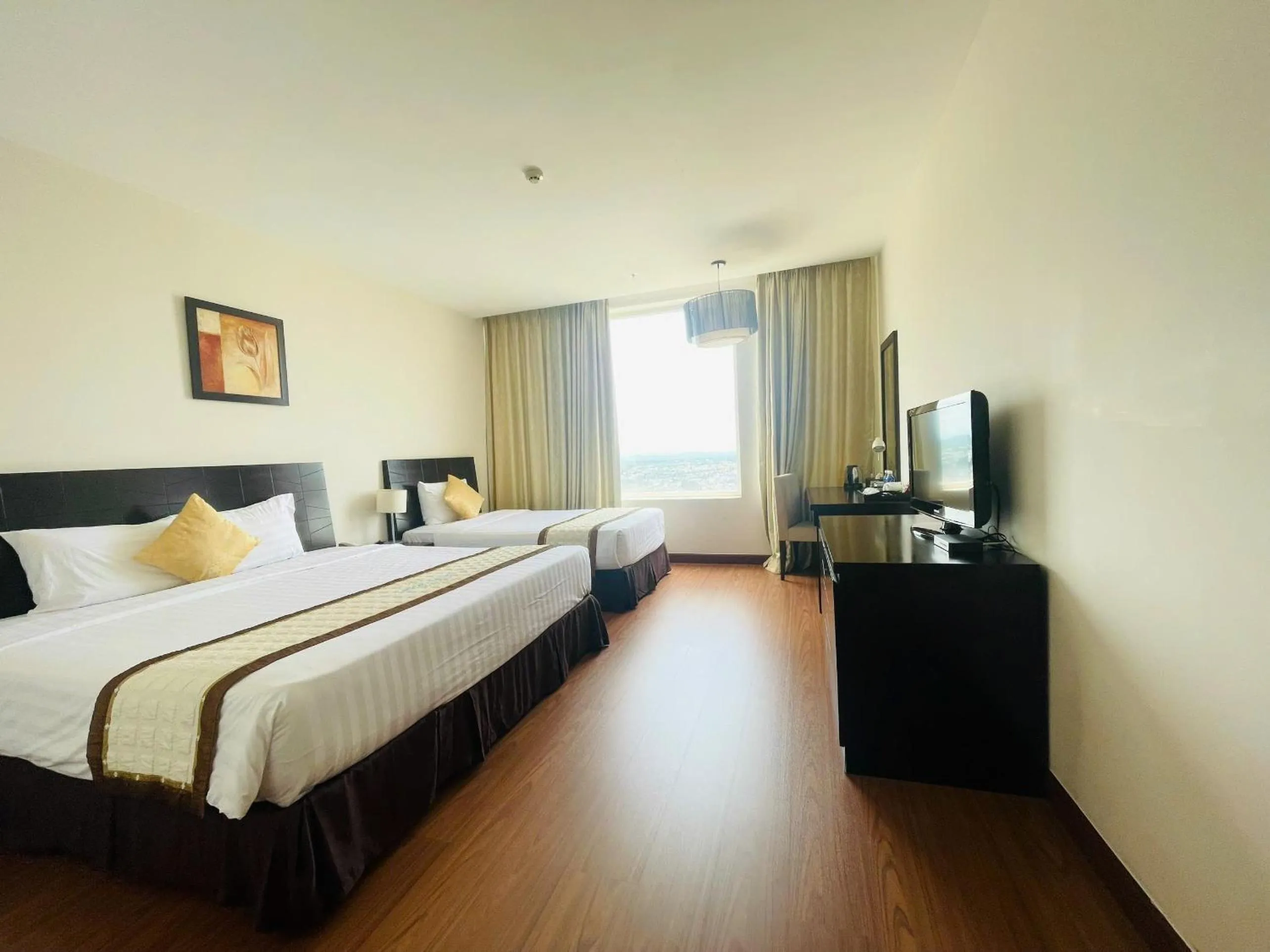 Bed in Sai Gon Ban Me Hotel