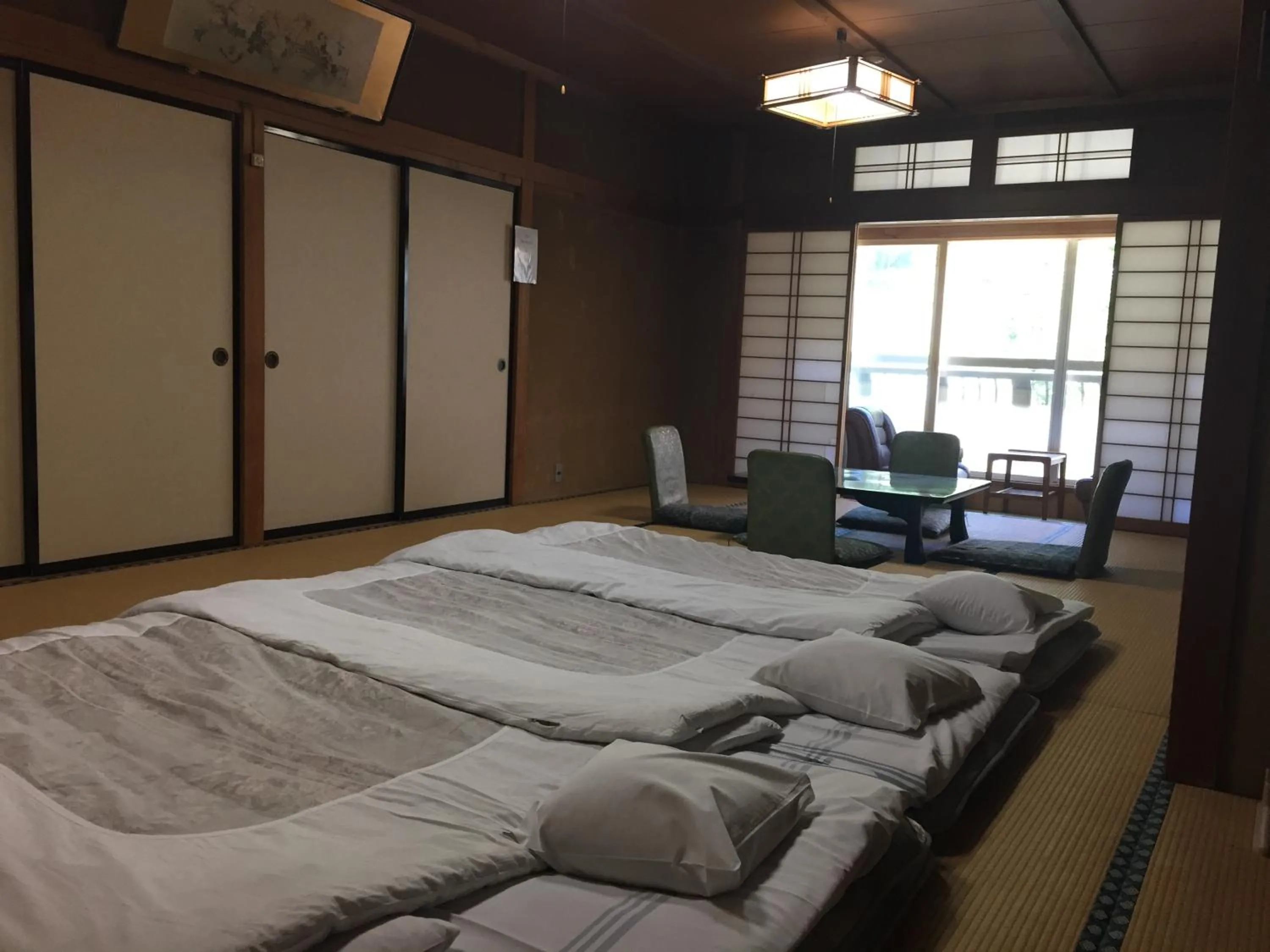 Photo of the whole room, Bed in Daymaruya Ryokan