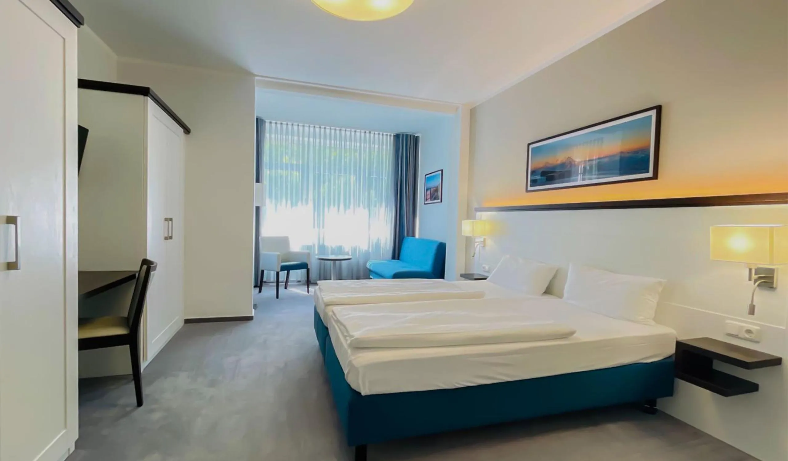 Photo of the whole room, Bed in Strandhotel Graal-Müritz