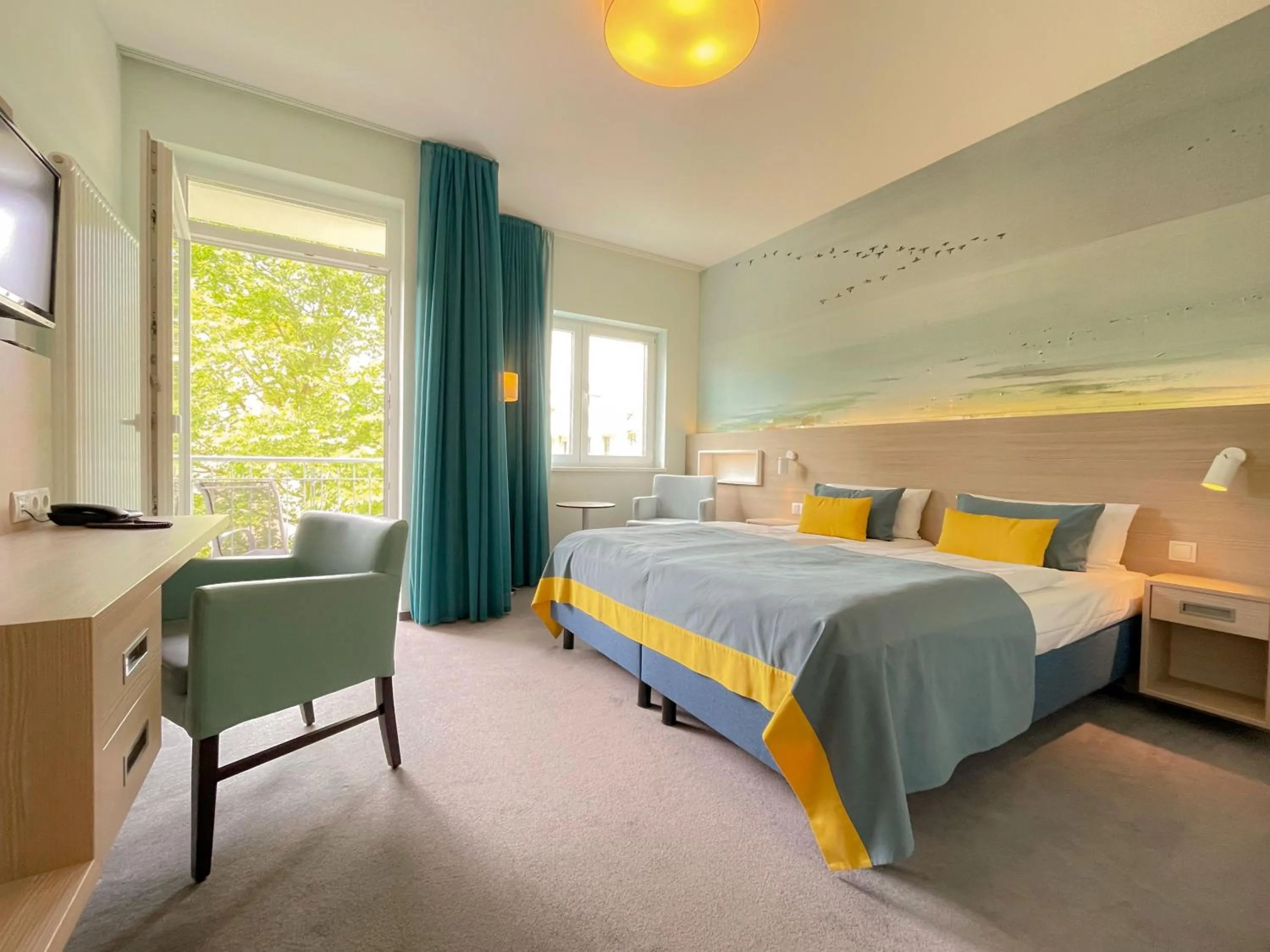 Photo of the whole room, Bed in Strandhotel Graal-Müritz