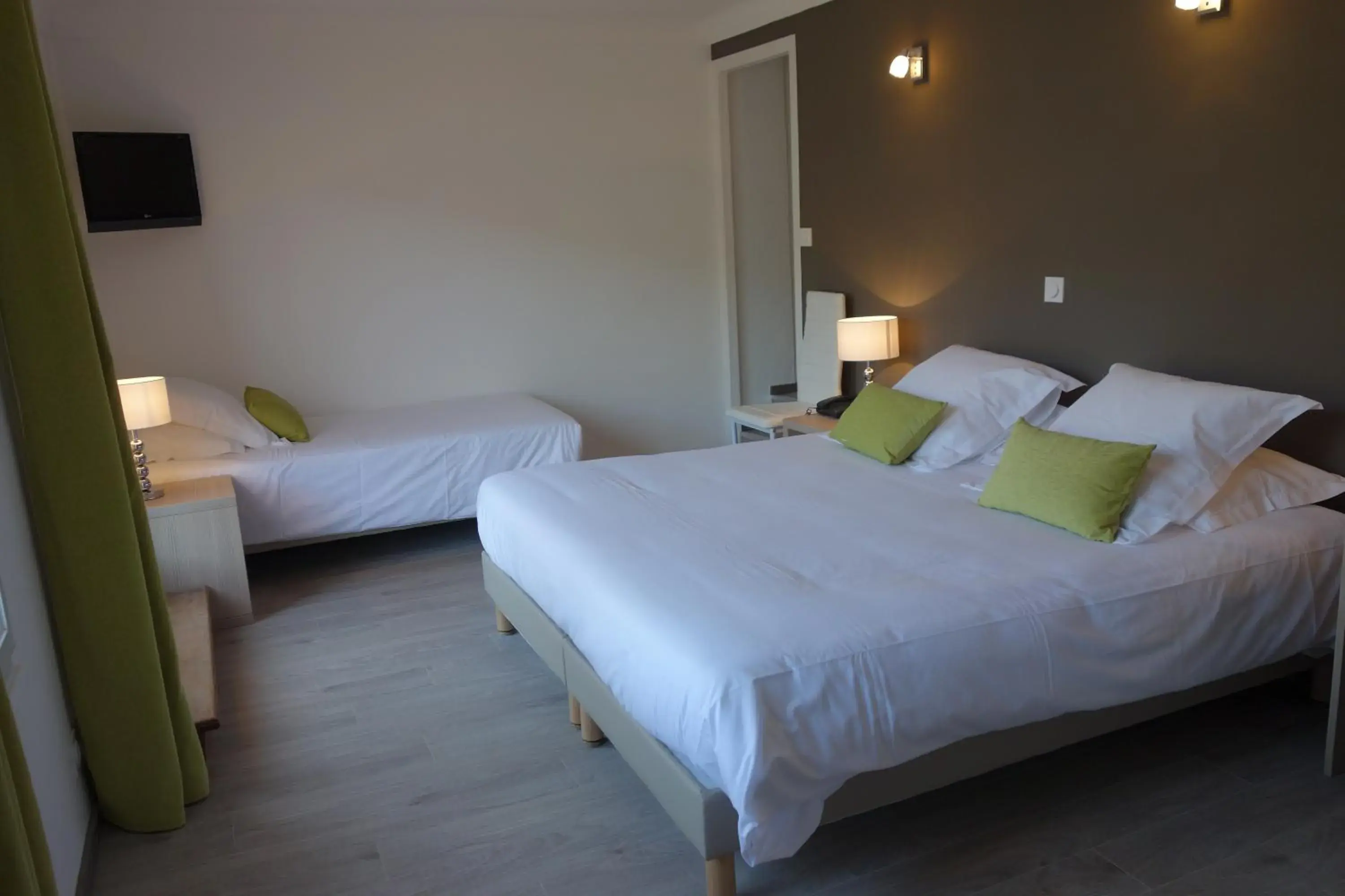 Superior Triple Room with Terrace in Hotel le Préjoly Superior Triple Room with Terrace in Hotel le Préjoly