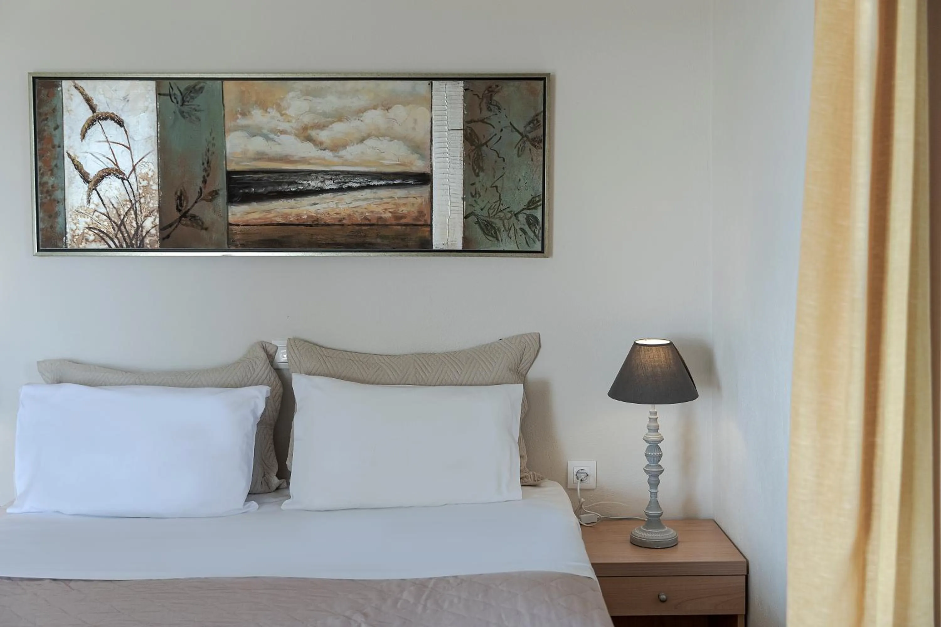 Bed in Ambeli Apartments