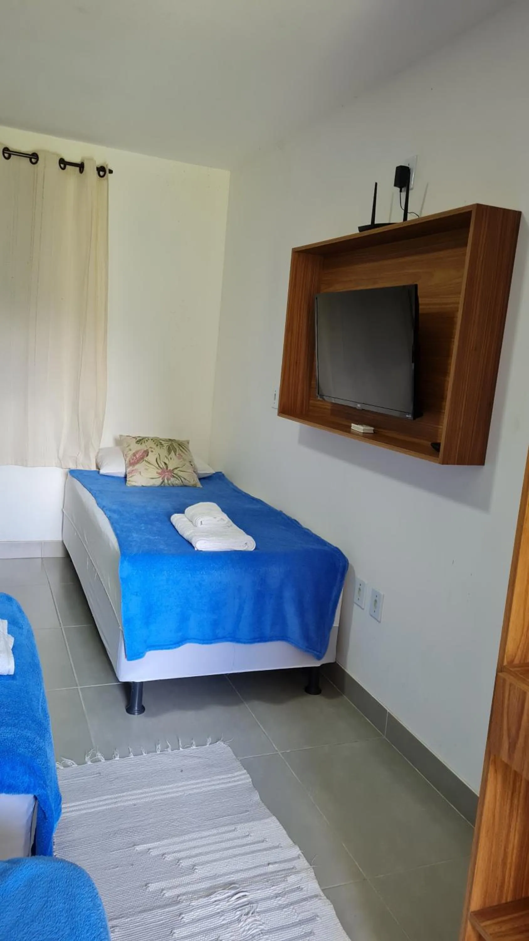 Bed in Pousada Jeito Bom de Viver