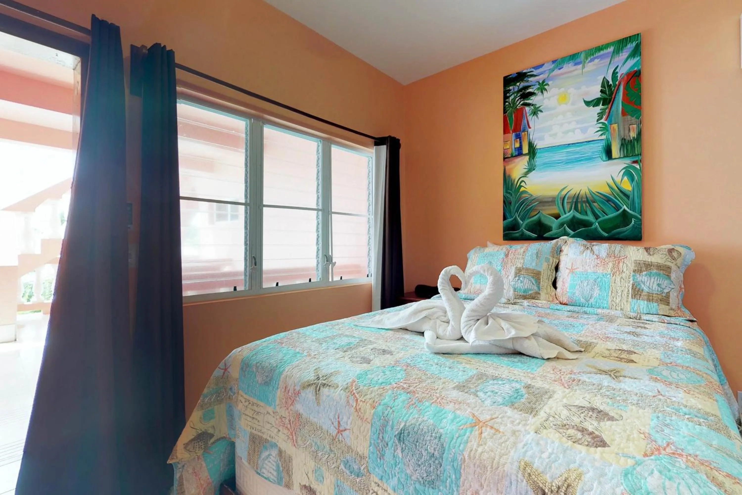 Bed in Caribbean Lily @ Caribe Island