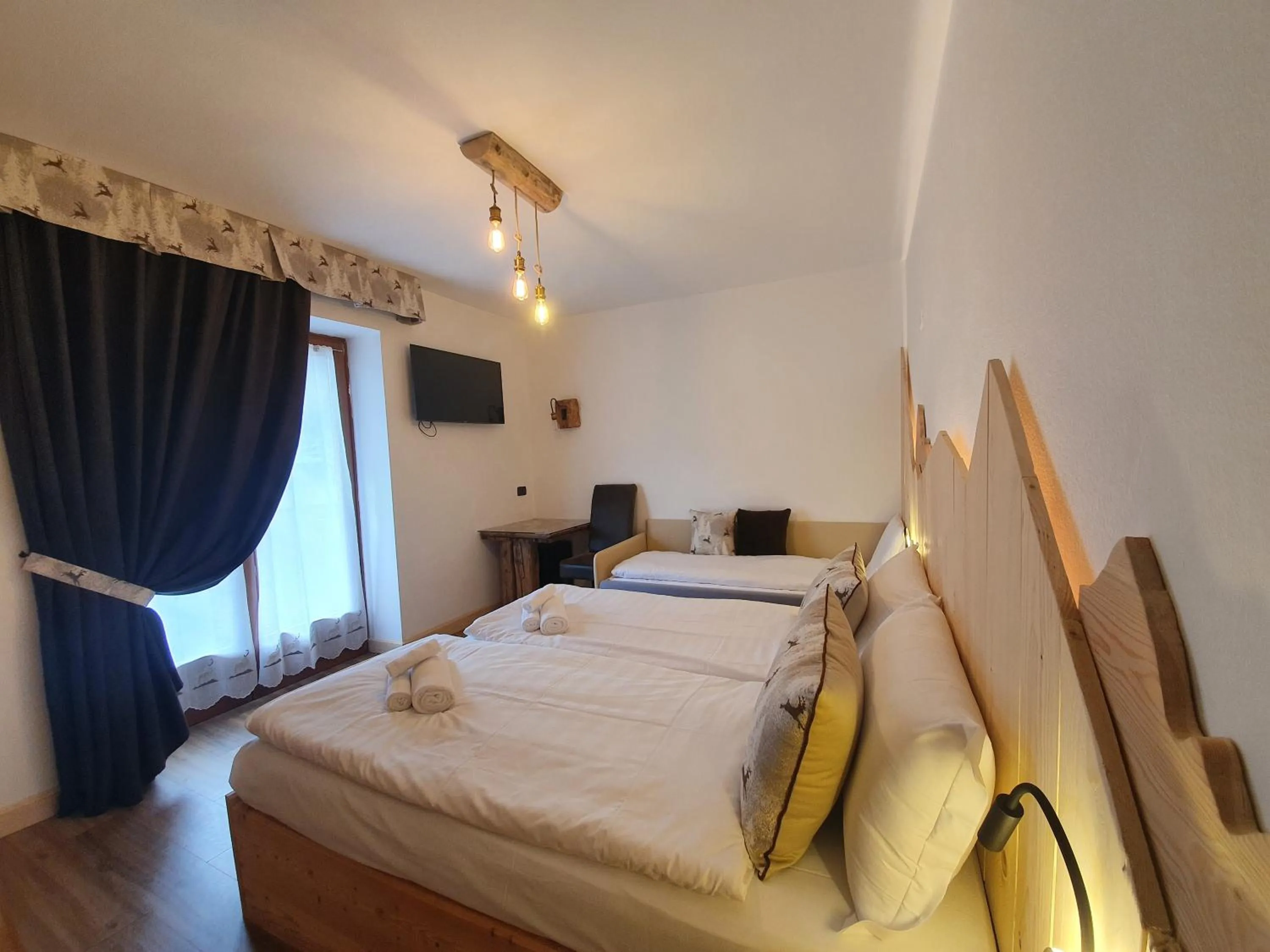 Bed in Hotel Pezzotti