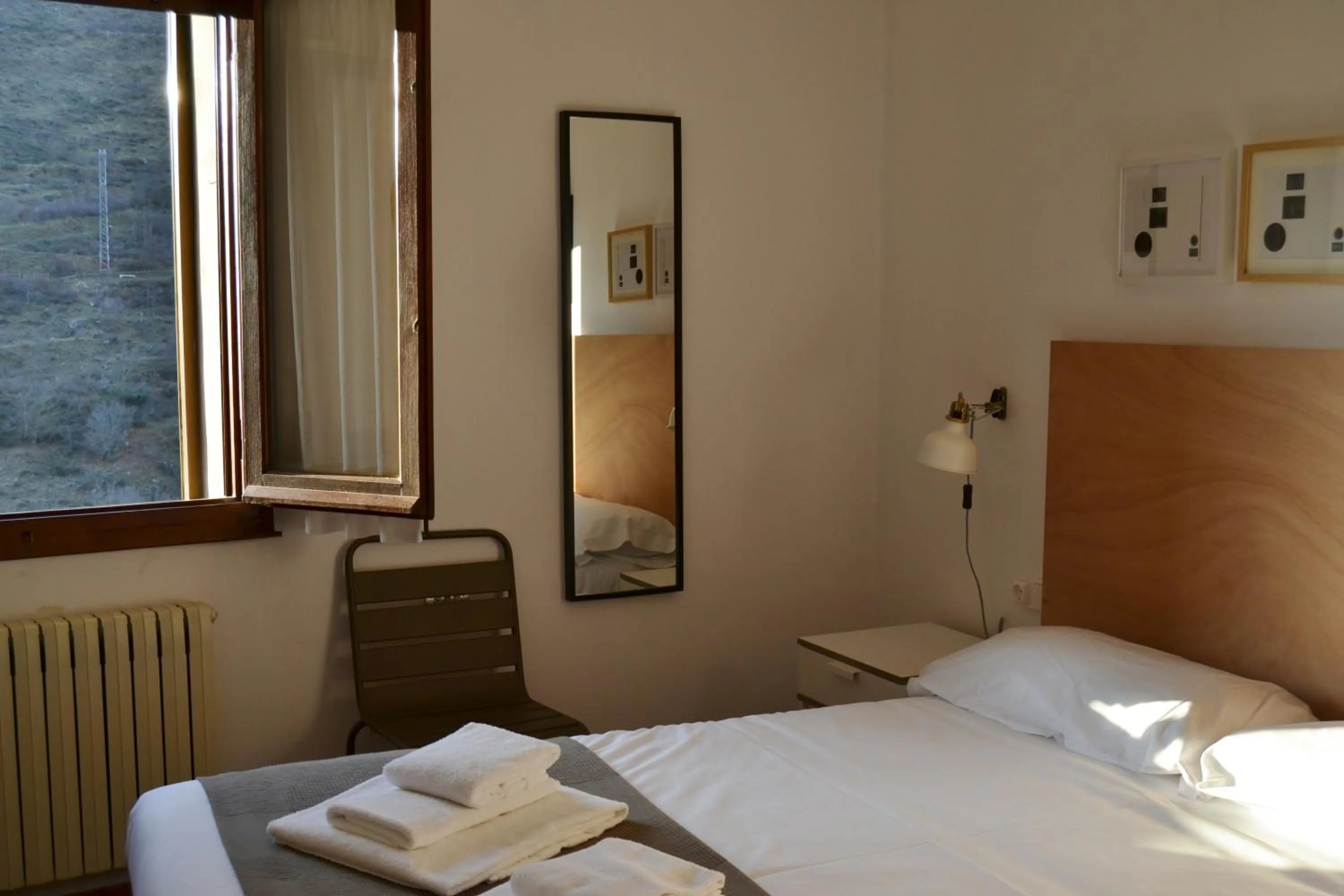 Photo of the whole room, Bed in Tres Puentes Anguiano Apartamentos y Hostal