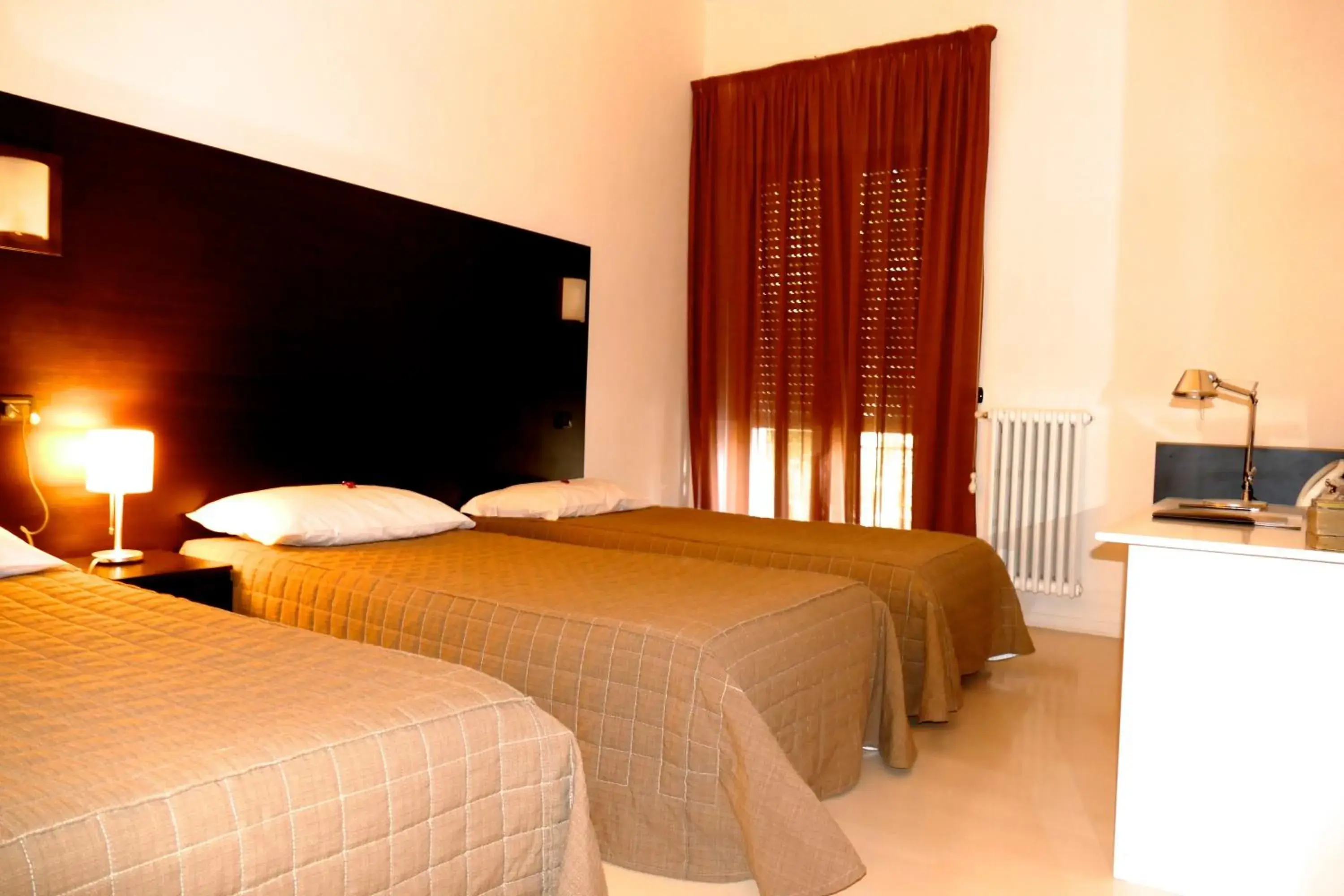 Triple Room in Hotel Colucci Triple Room in Hotel Colucci