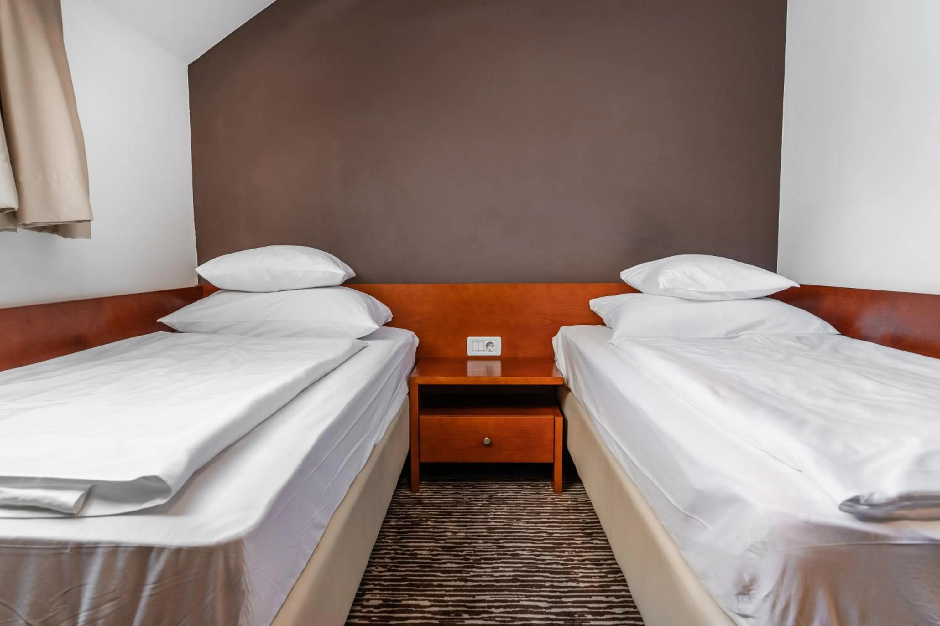 Bed in Hotel Kranjska Gora