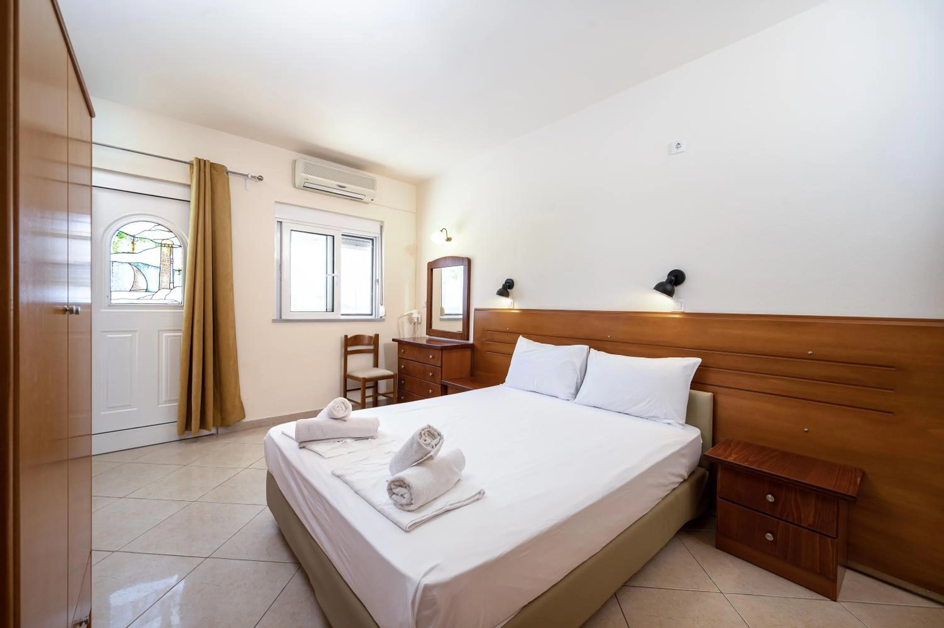 Bed in Mammis Beach Hotel