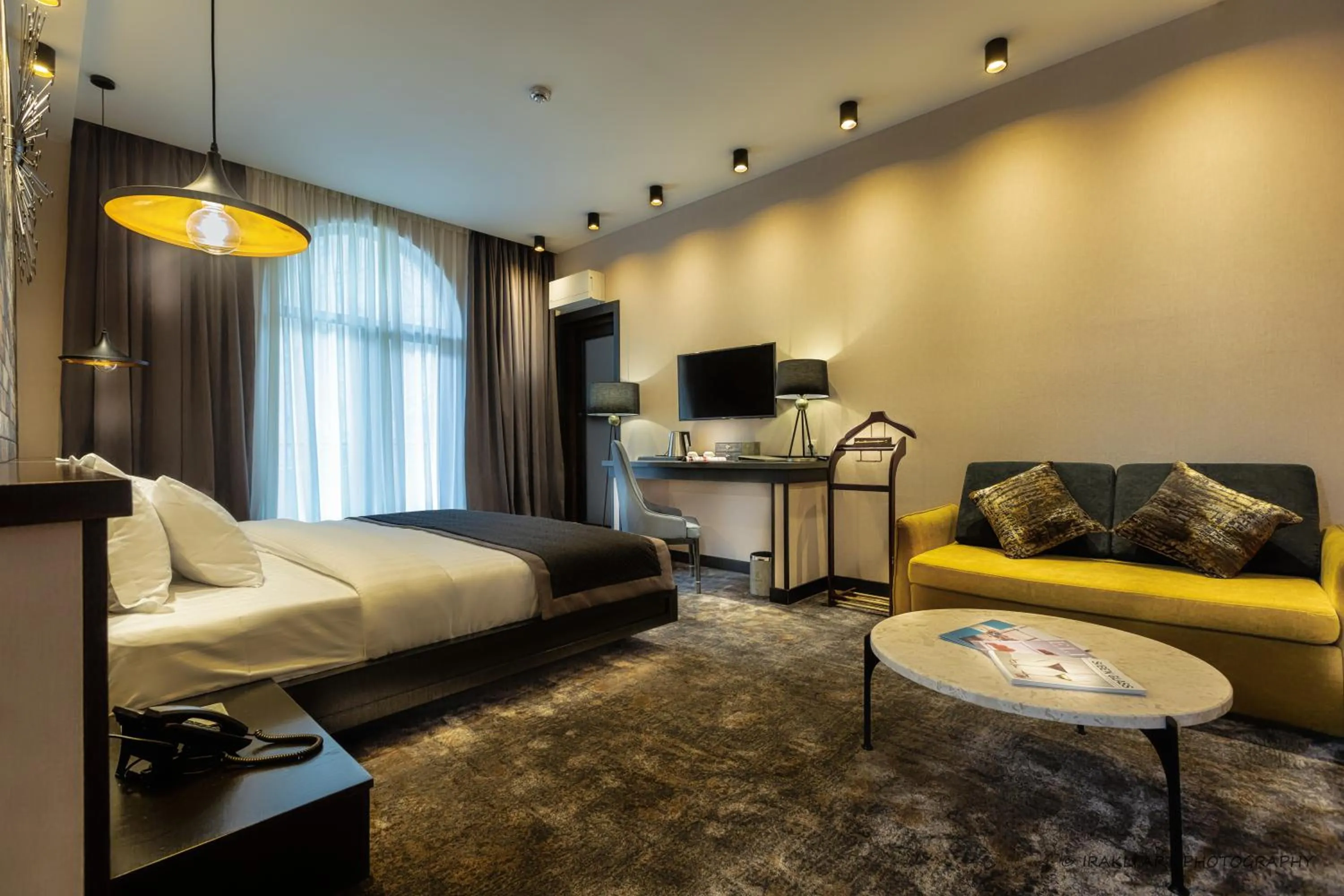 Living room, Bed in Hotel Adamo