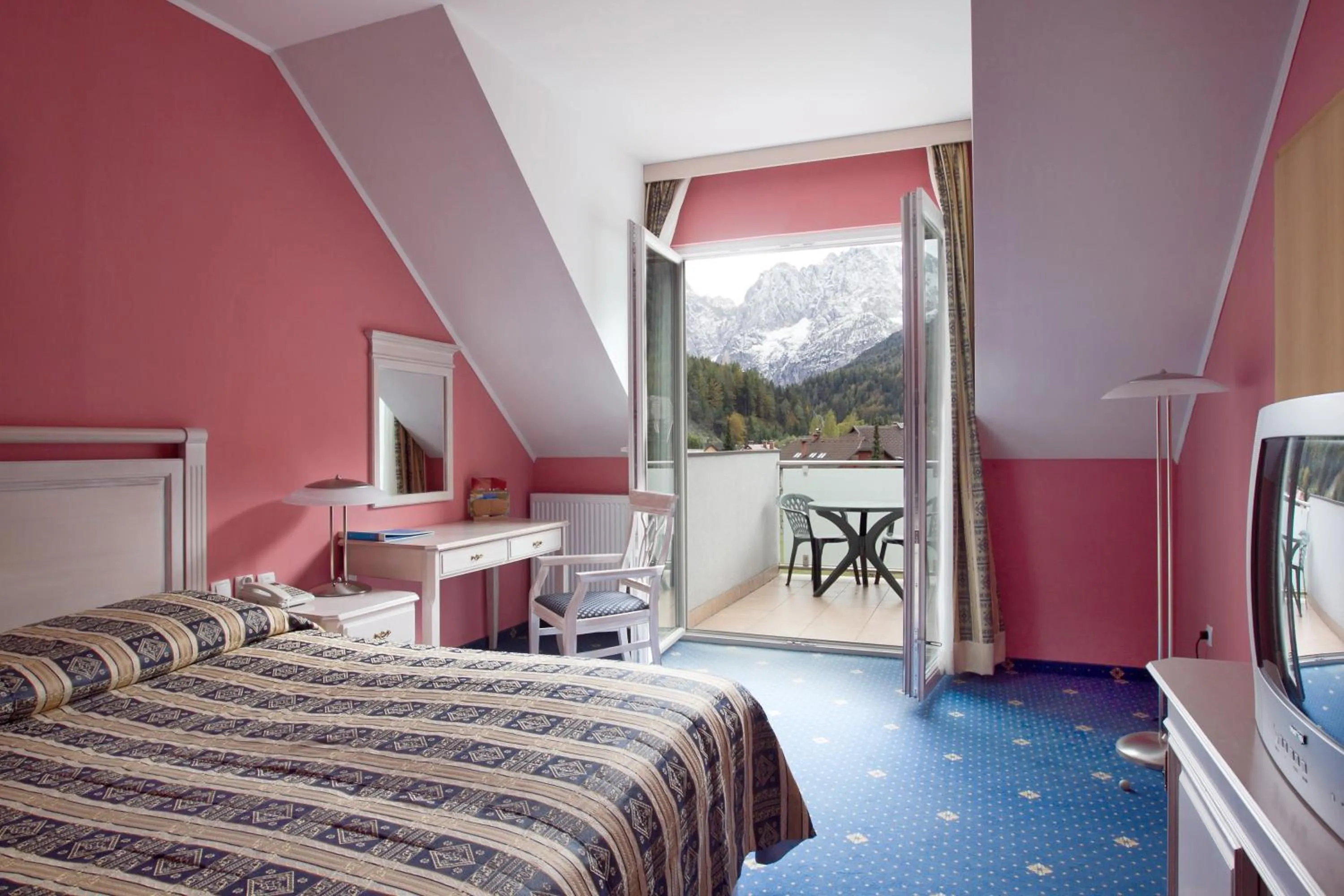 Bed in Ramada Hotel & Suites Kranjska Gora