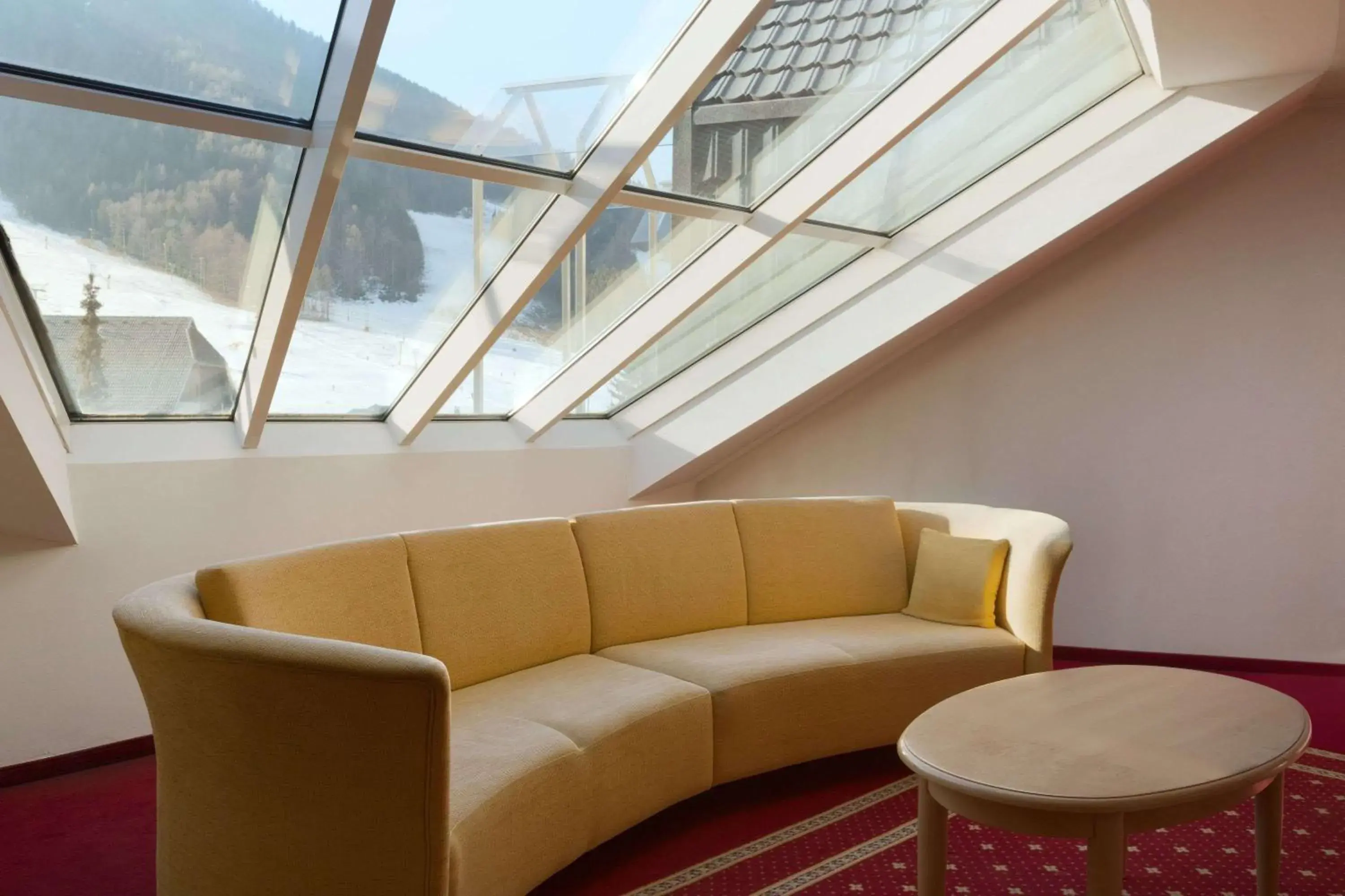 Lobby or reception in Ramada Hotel & Suites Kranjska Gora Lobby or reception in Ramada Hotel & Suites Kranjska Gora