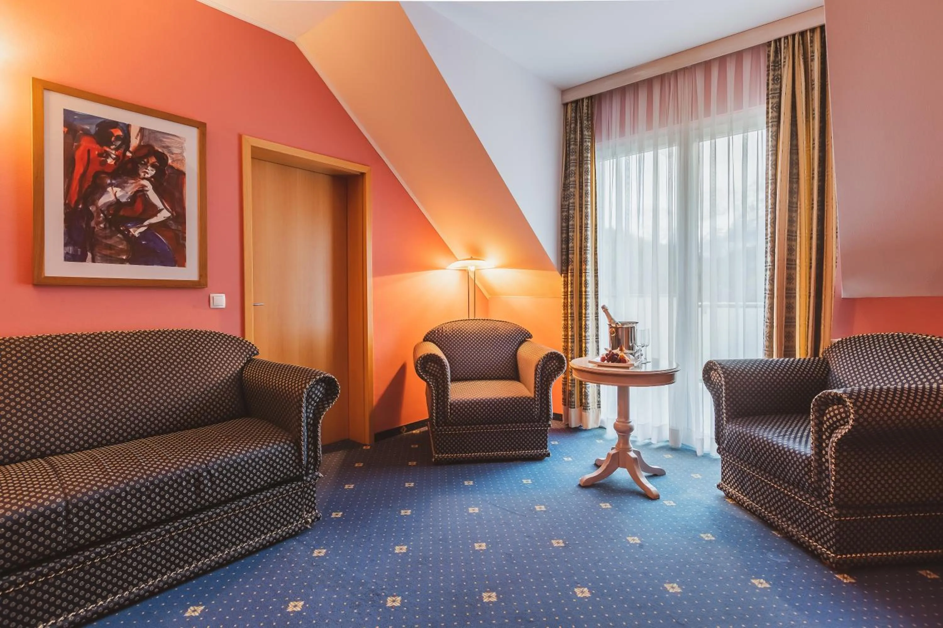 Living room in Ramada Hotel & Suites Kranjska Gora