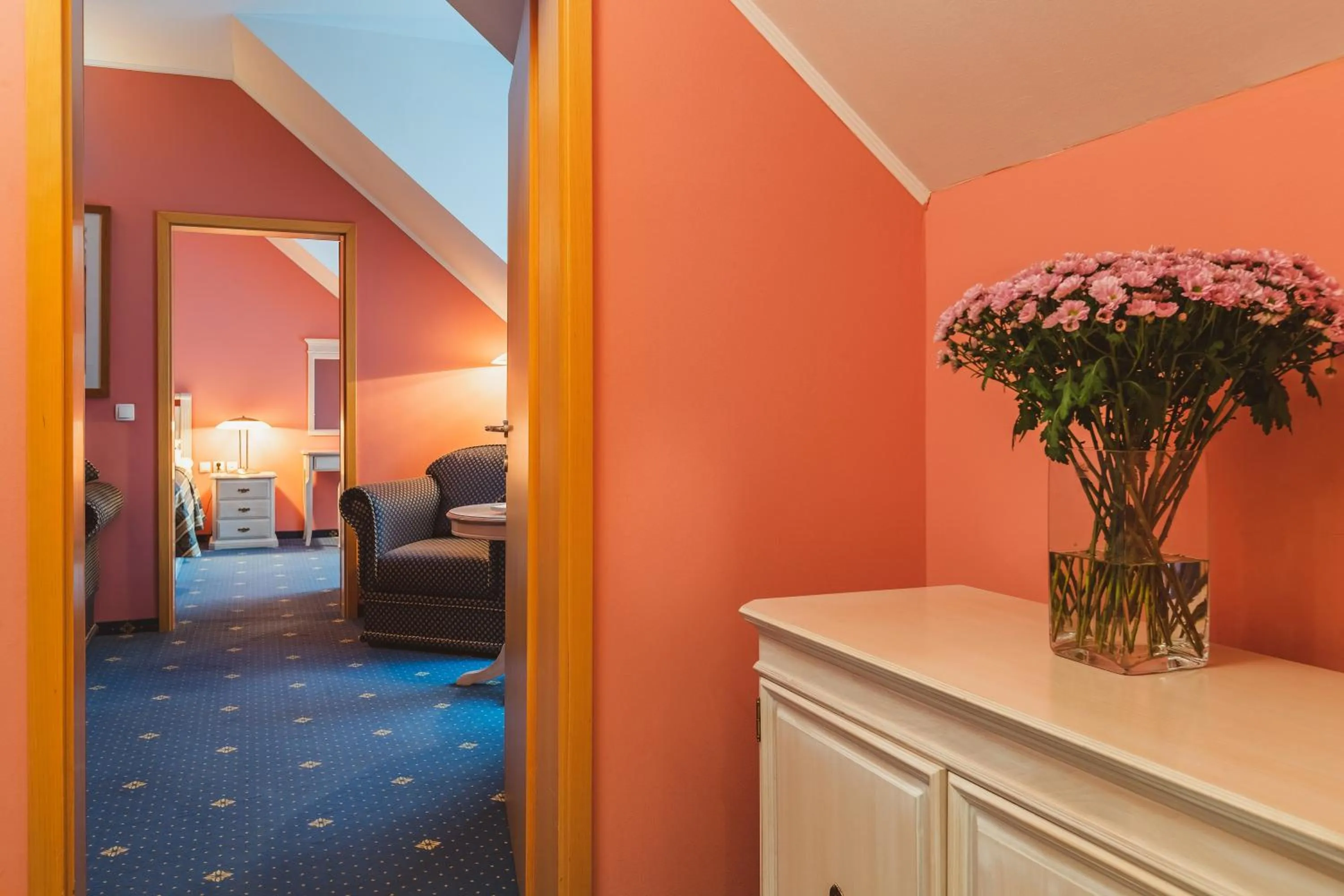 Seating area, Bed in Ramada Hotel & Suites Kranjska Gora