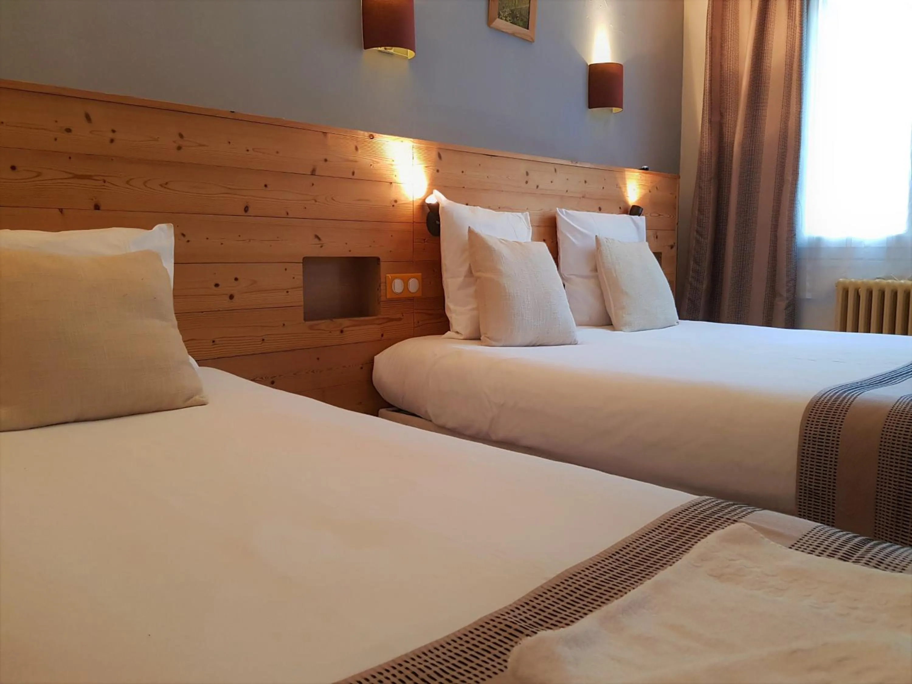 Bed in Savoy Hotel & Restaurant