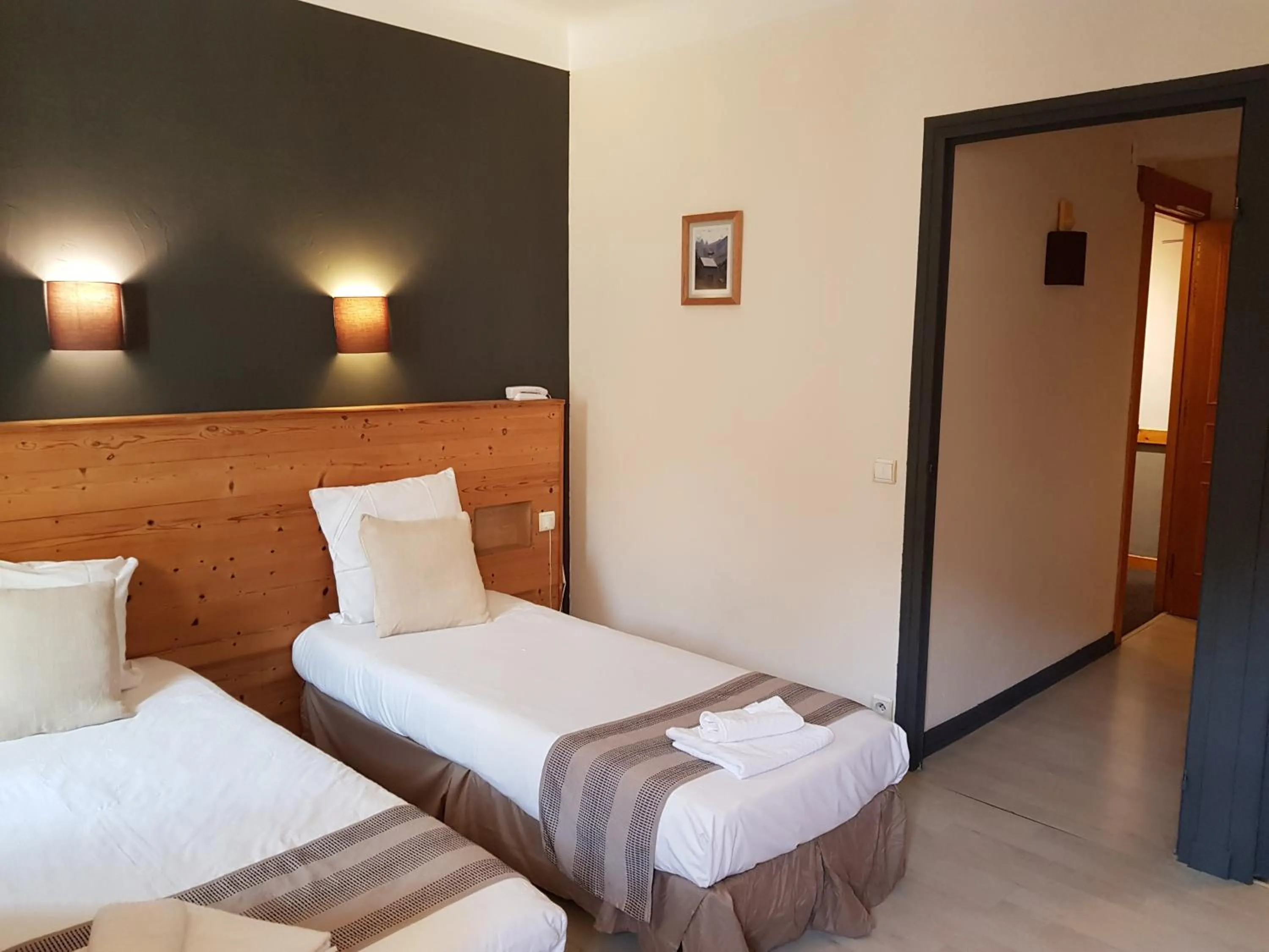 Bed in Savoy Hotel & Restaurant