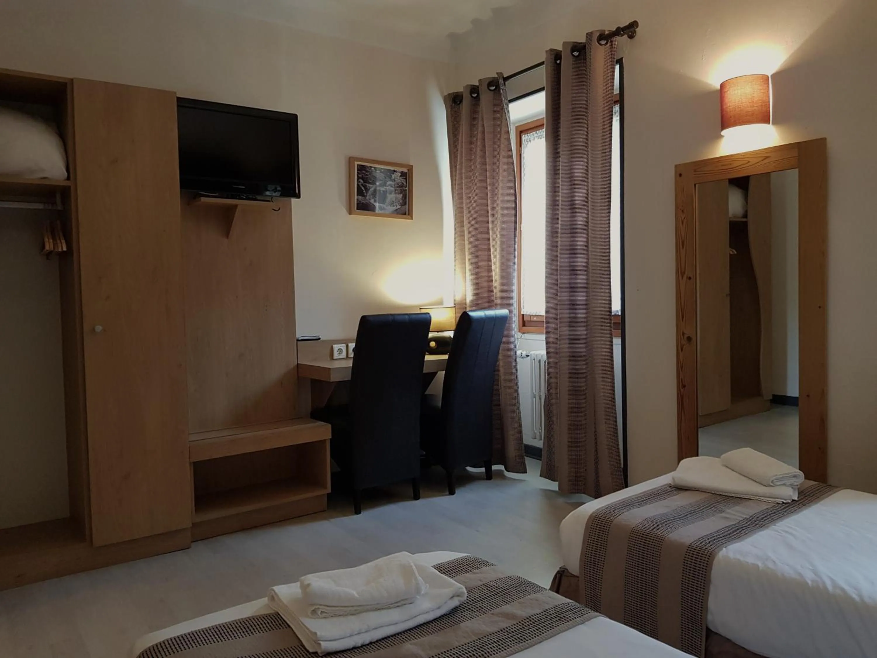 Photo of the whole room, Bed in Savoy Hotel & Restaurant