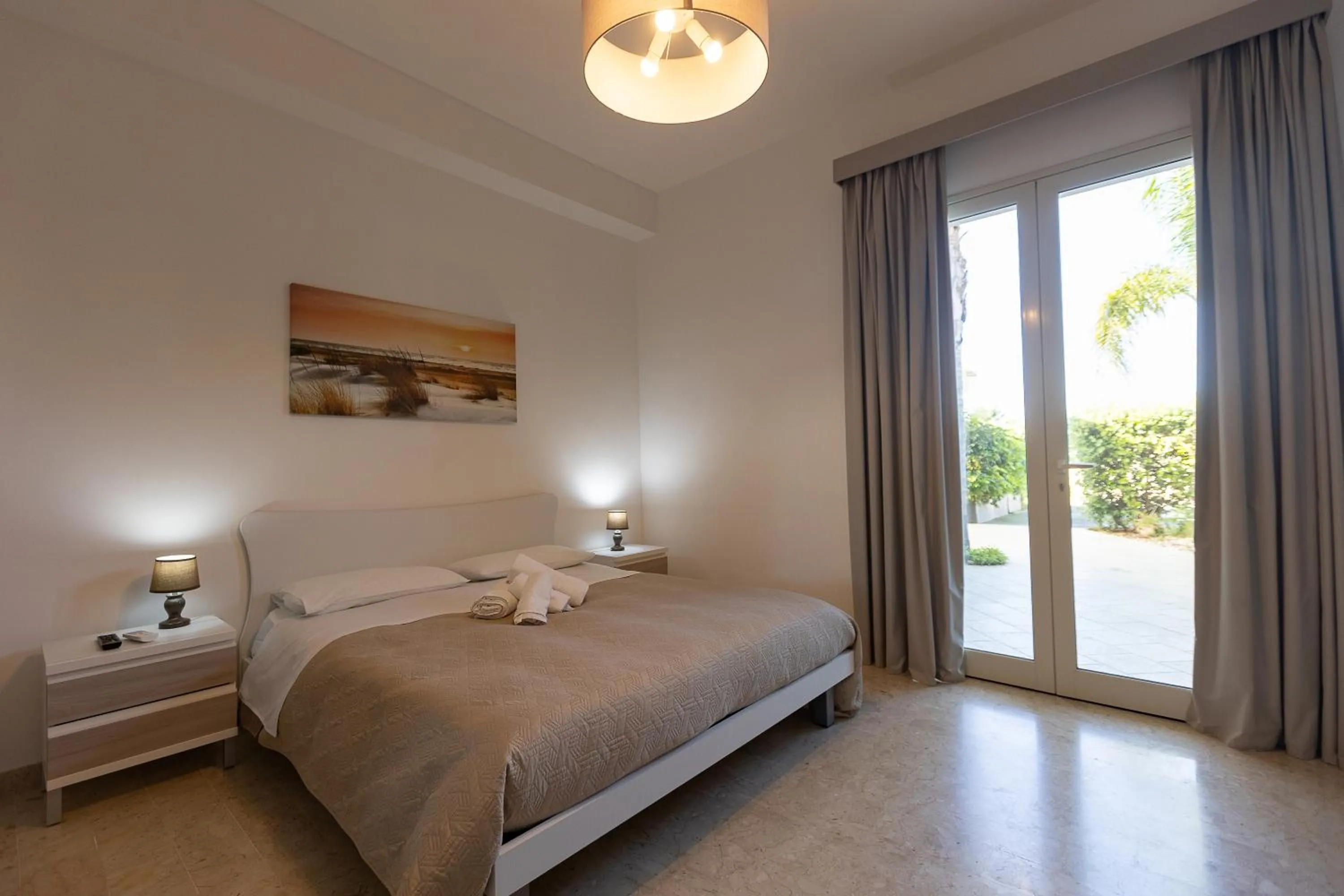 Bed in La Rosa Dei Venti - Free Parking, Air Conditioning and Wi-Fi