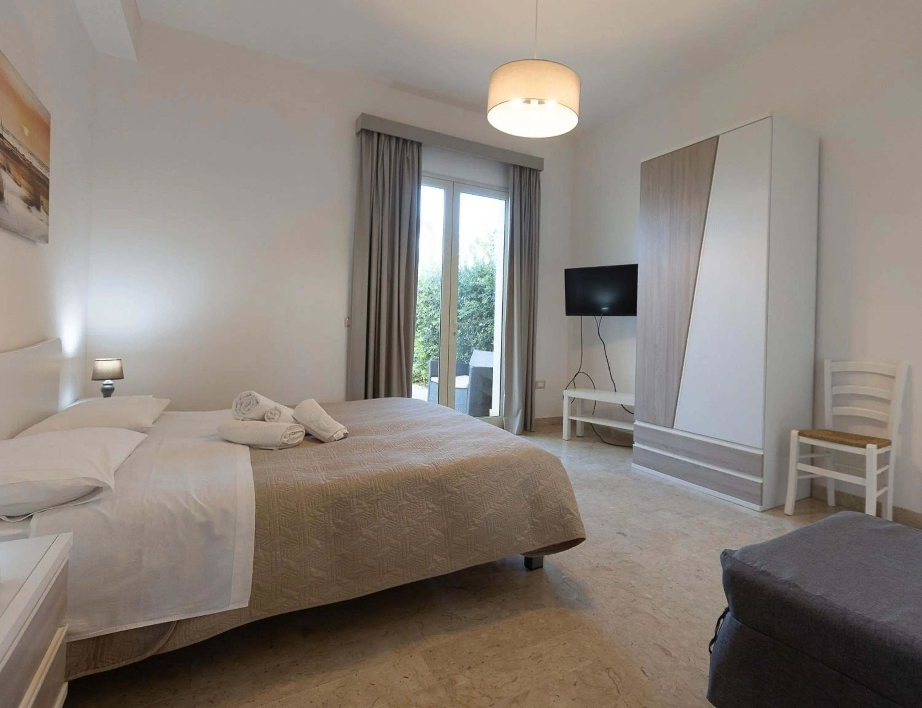 Bed in La Rosa Dei Venti - Free Parking, Air Conditioning and Wi-Fi