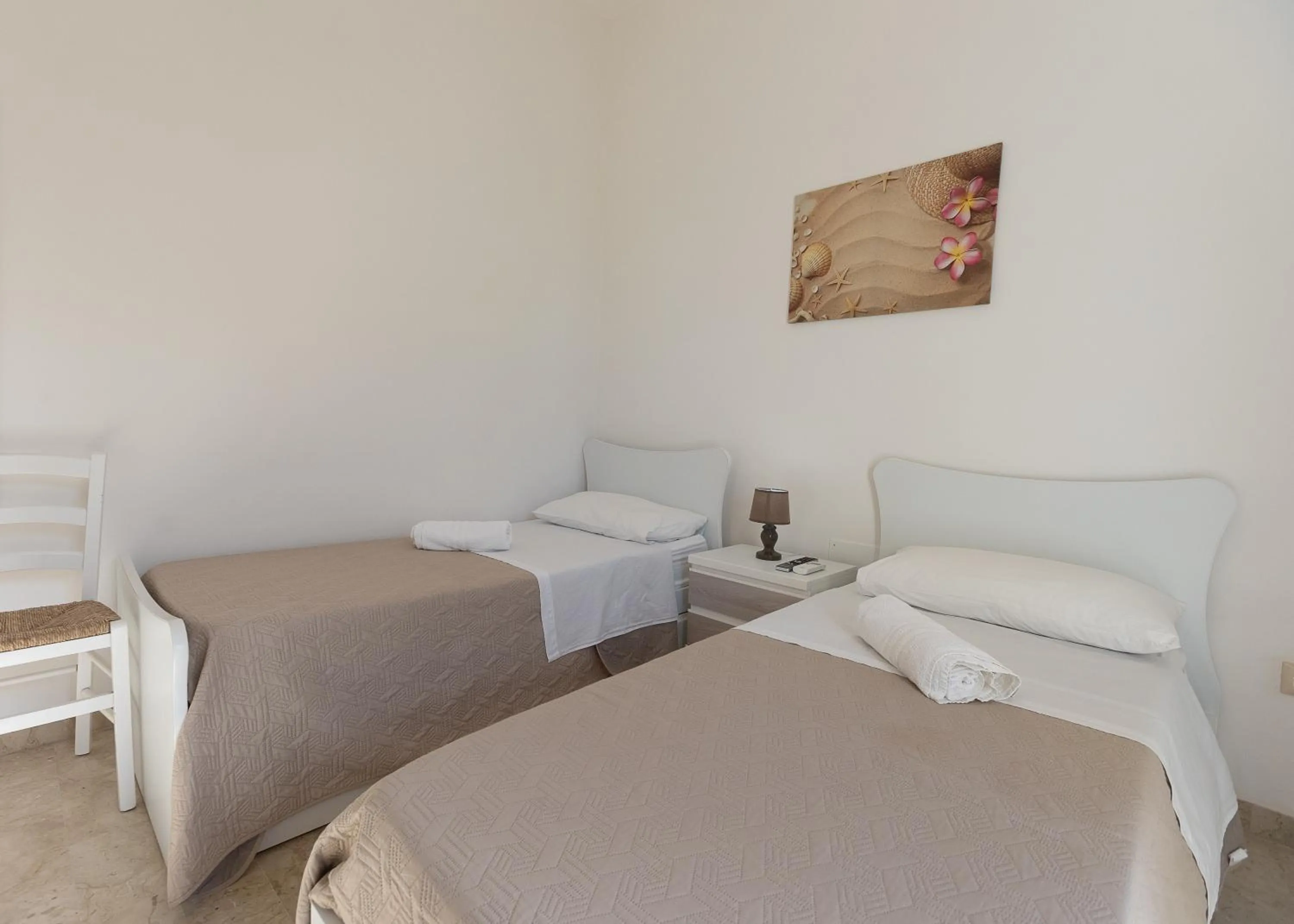 Bed in La Rosa Dei Venti - Free Parking, Air Conditioning and Wi-Fi