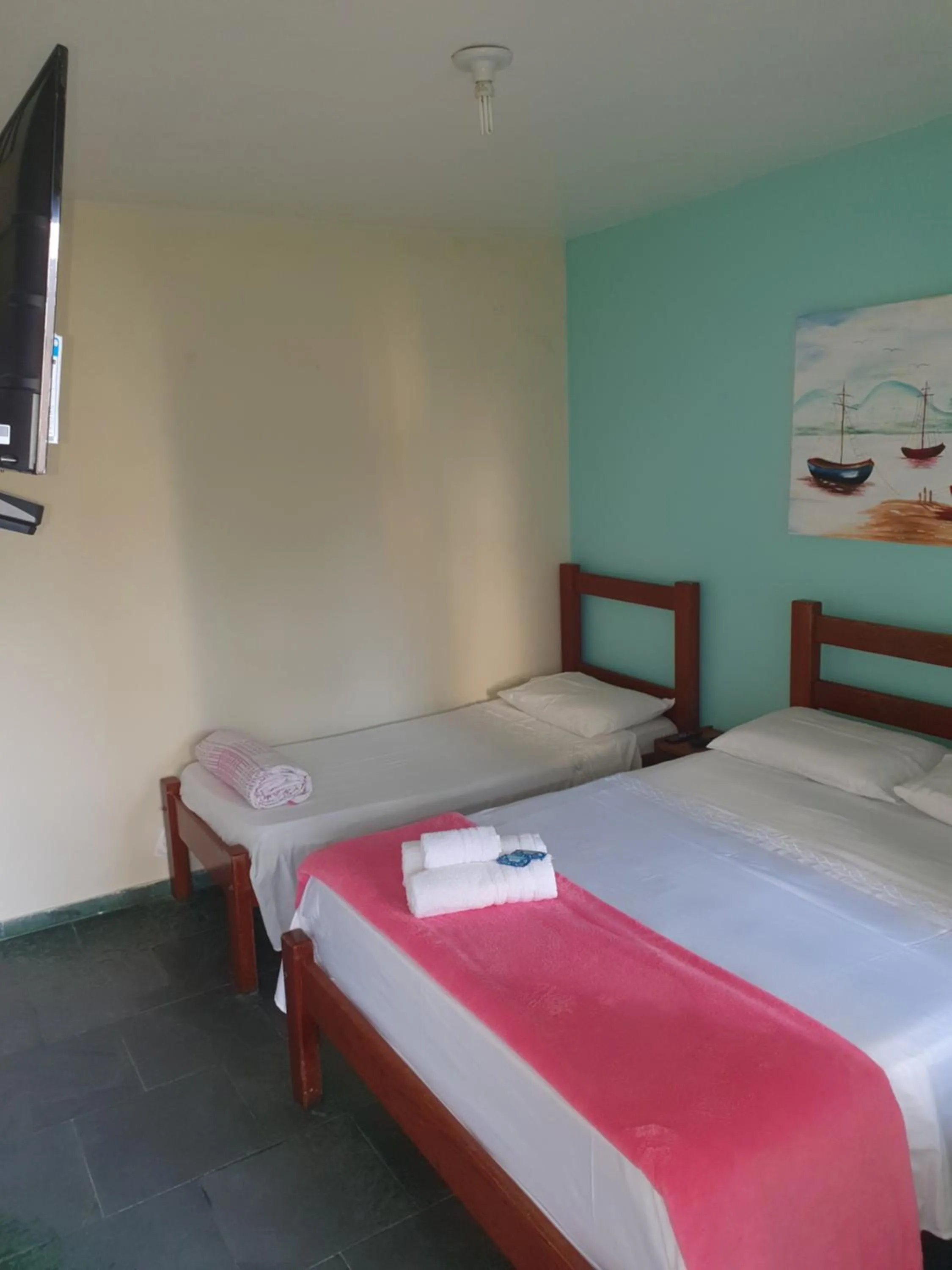 Bed in Pousada Cavalo Marinho