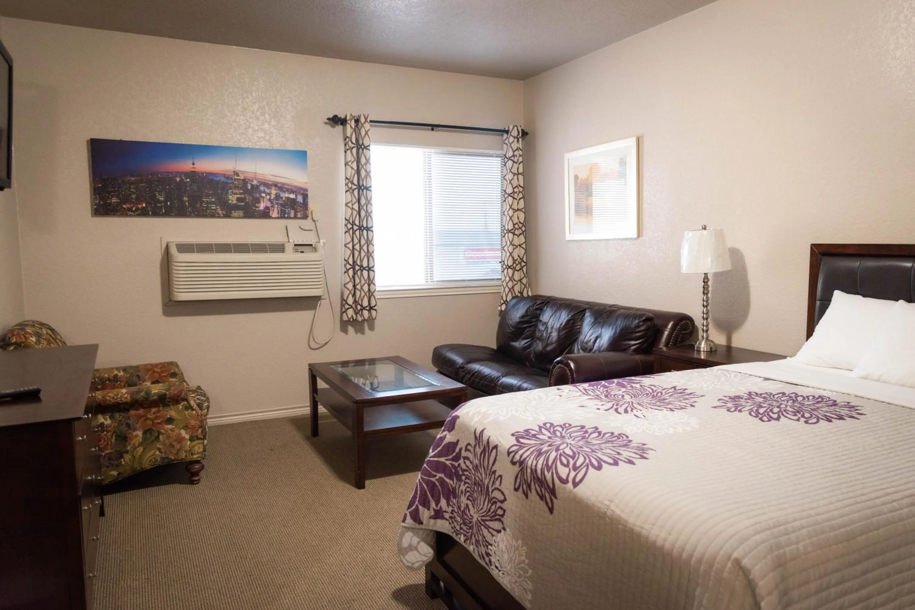 Bed in Premium Inn and Suites