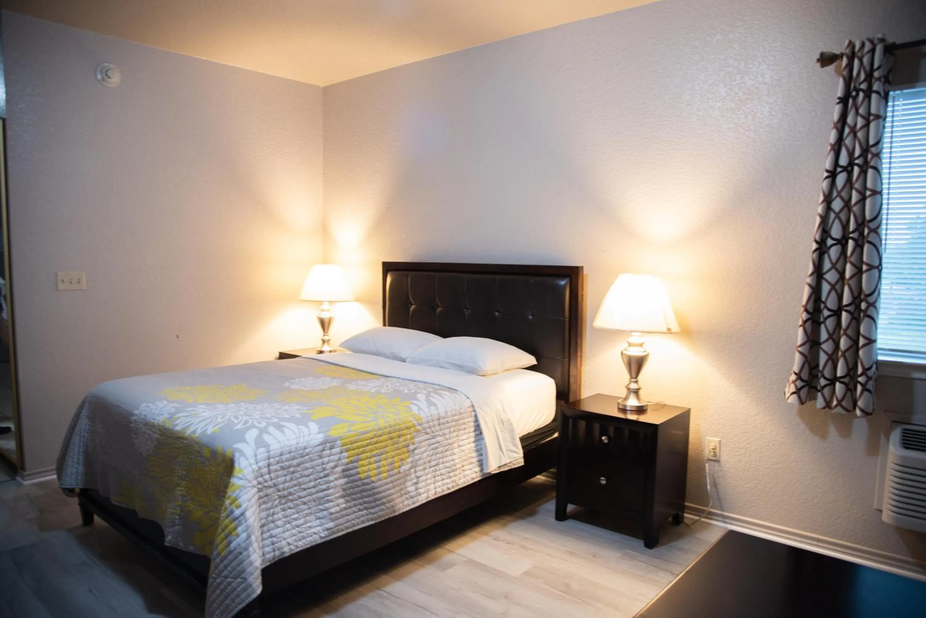 Bed in Premium Inn and Suites