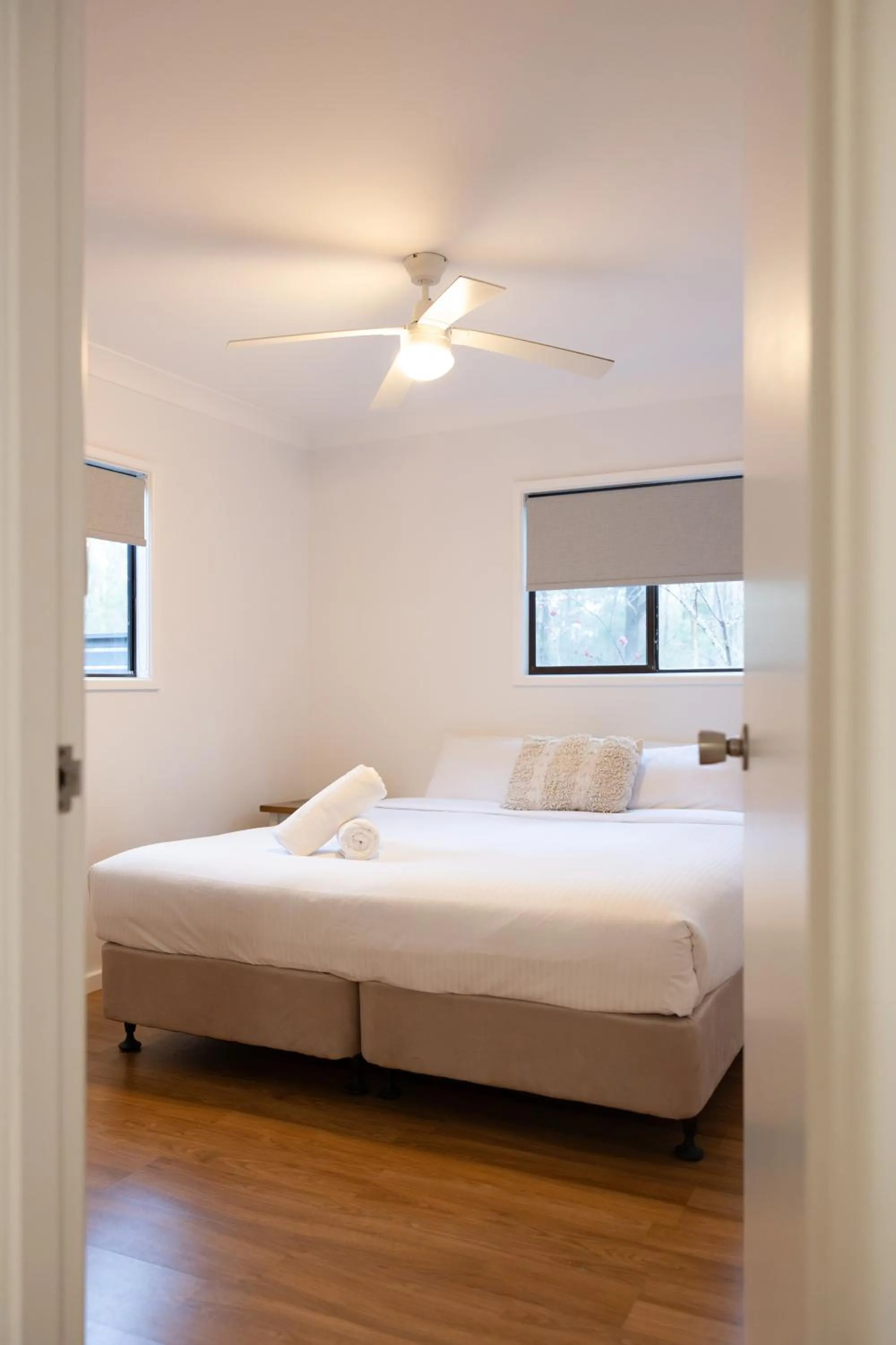 Bed in Pokolbin Cottages