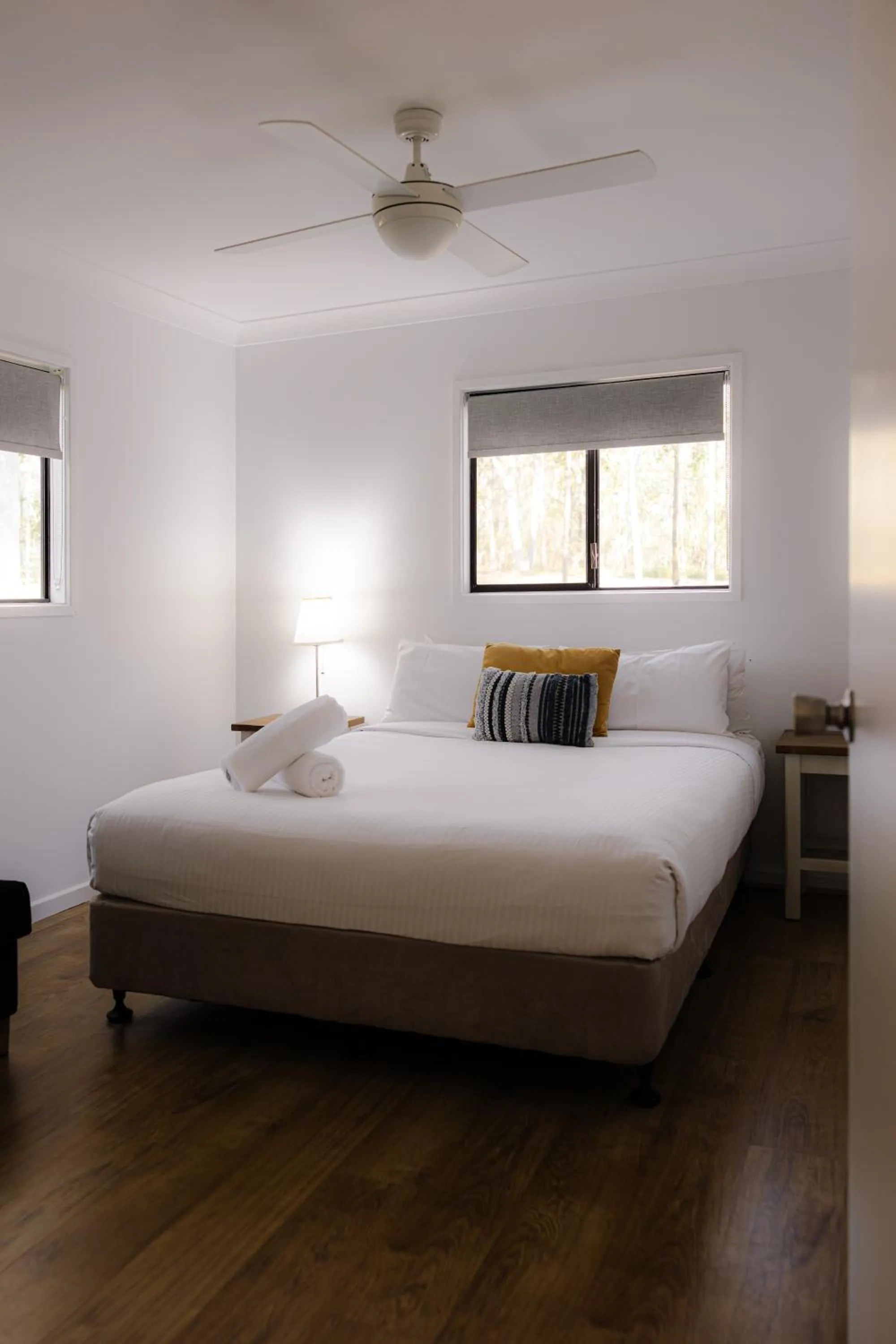 Bed in Pokolbin Cottages