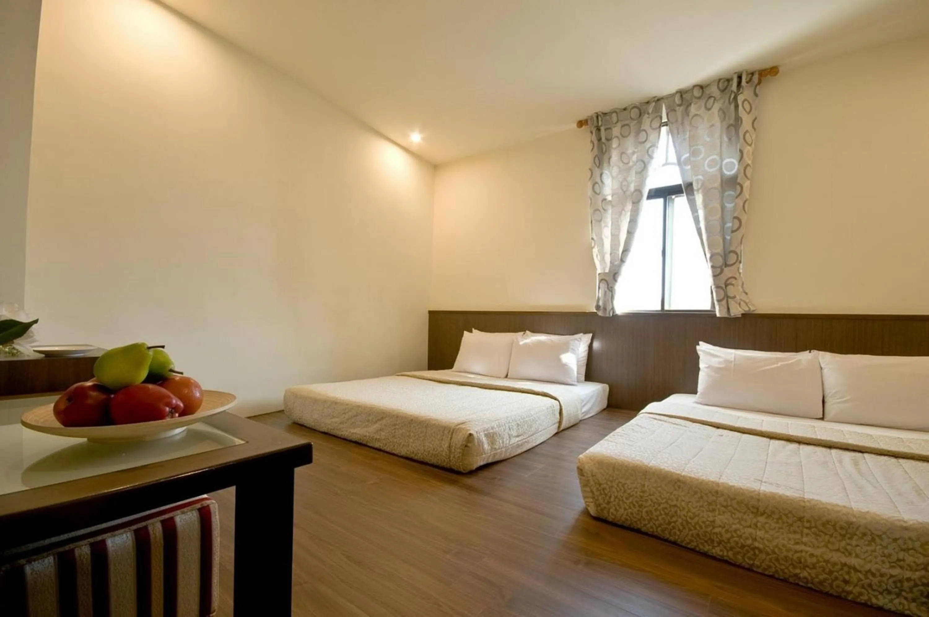 Photo of the whole room, Bed in Good Ground Hotel Tainan