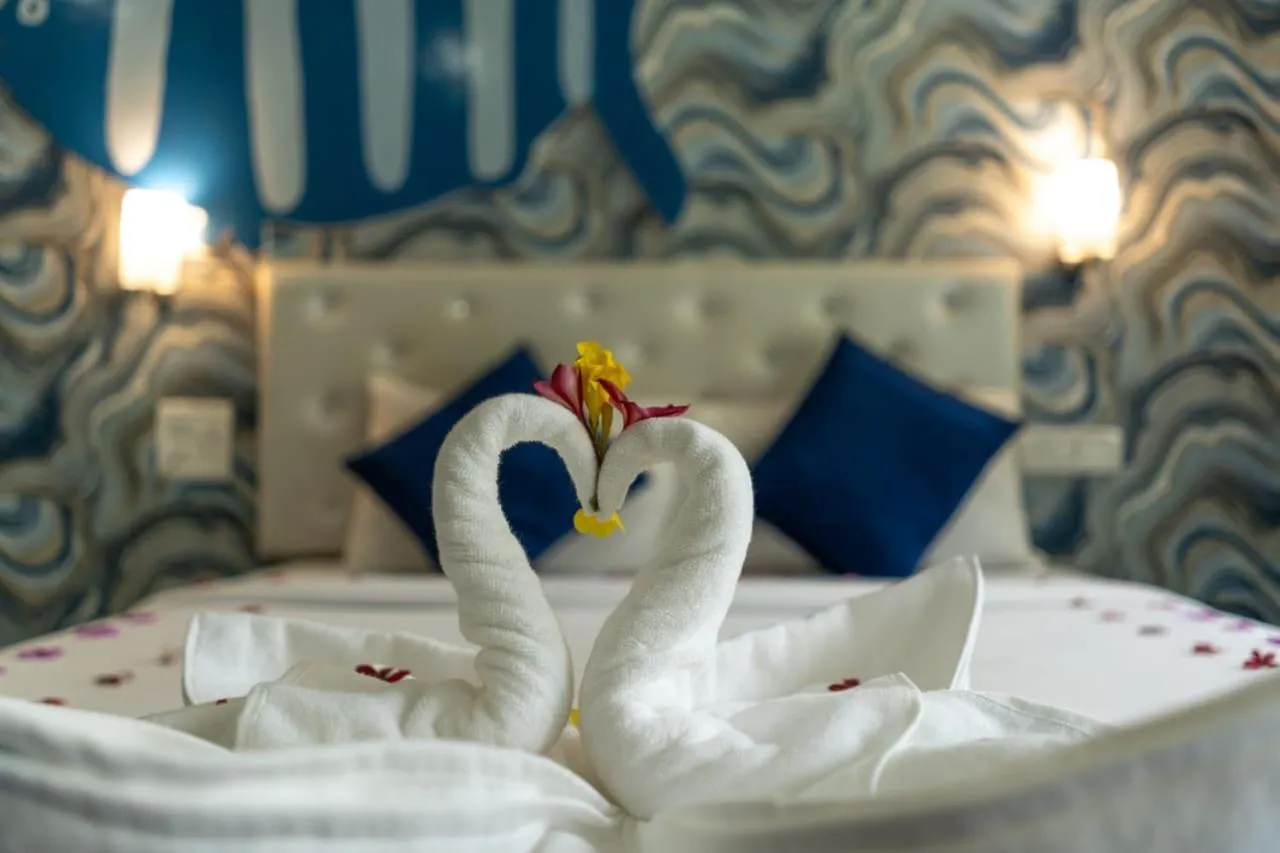 Bed in Paradise Village Beach Resort