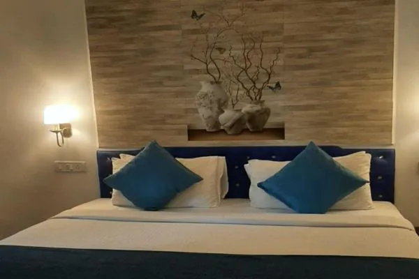 Bed in Paradise Village Beach Resort