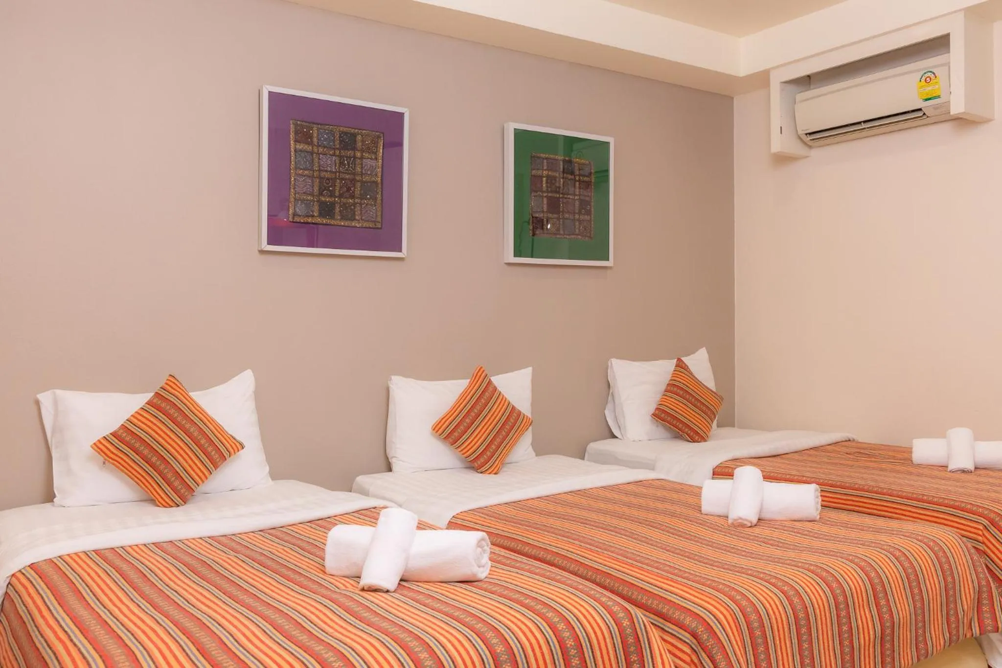 Bed in Rasa Boutique Hotel Chiang Rai