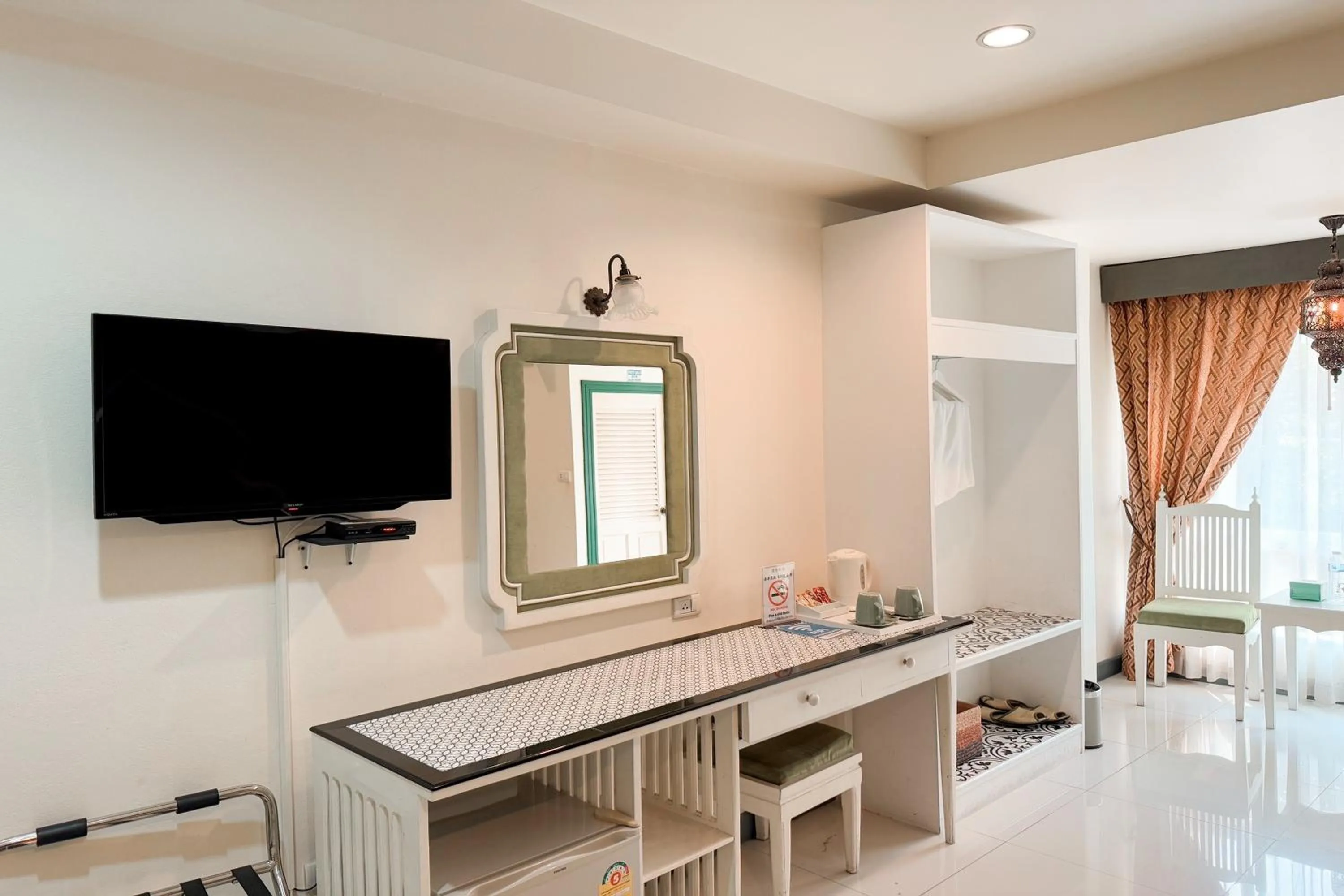 TV and multimedia in Rasa Boutique Hotel Chiang Rai