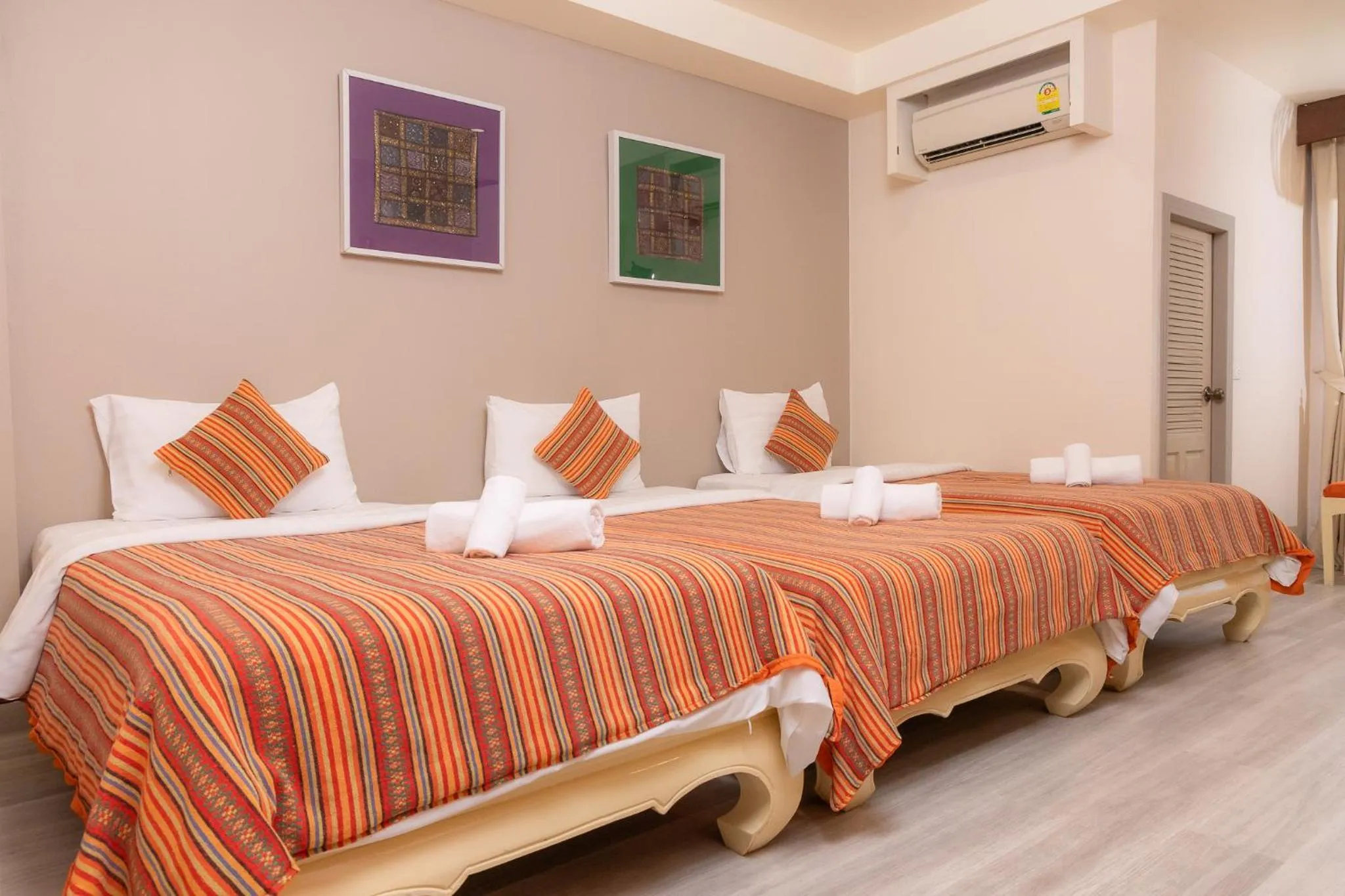 Bed in Rasa Boutique Hotel Chiang Rai