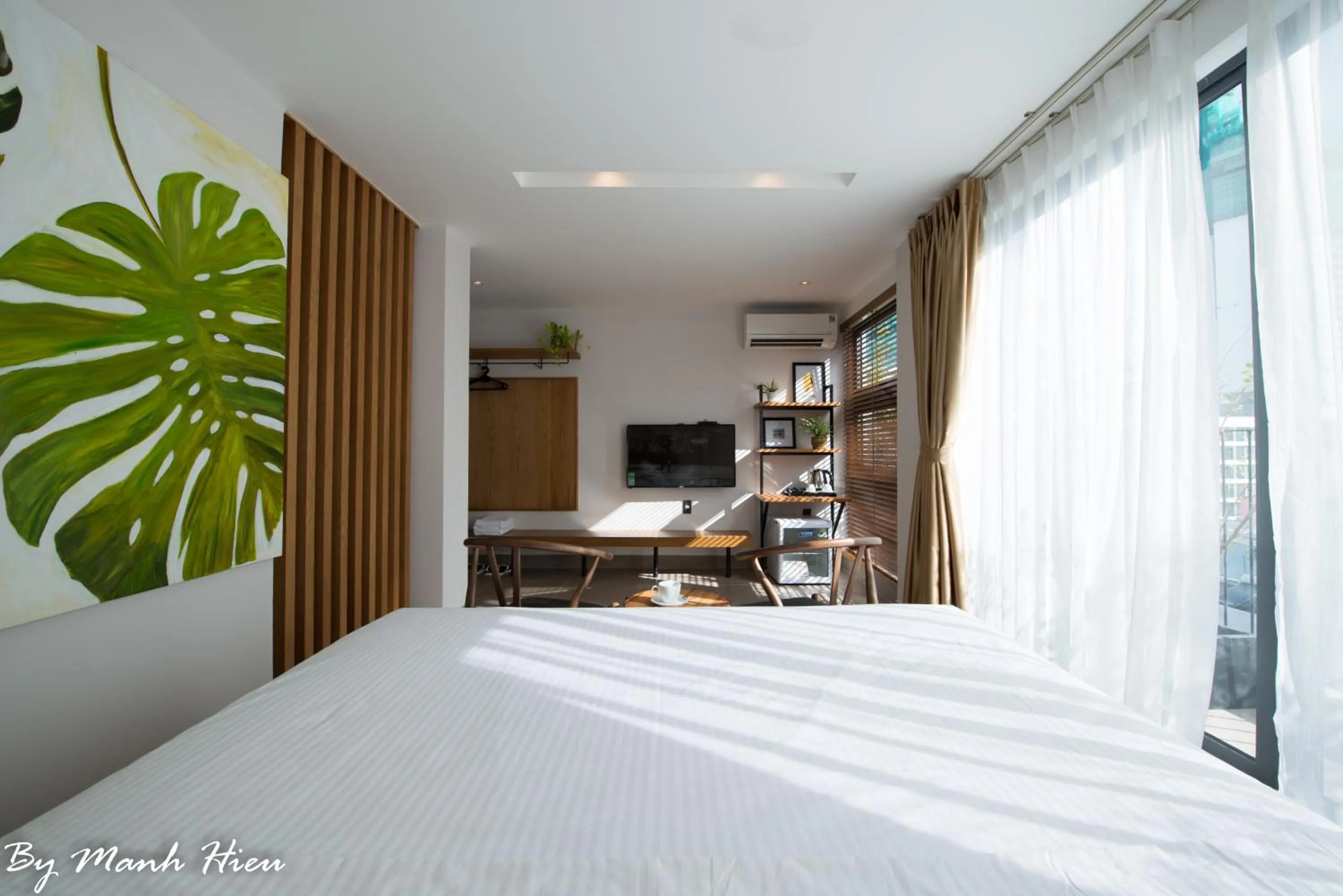 Bed in Mojzo Inn Boutique Hotel