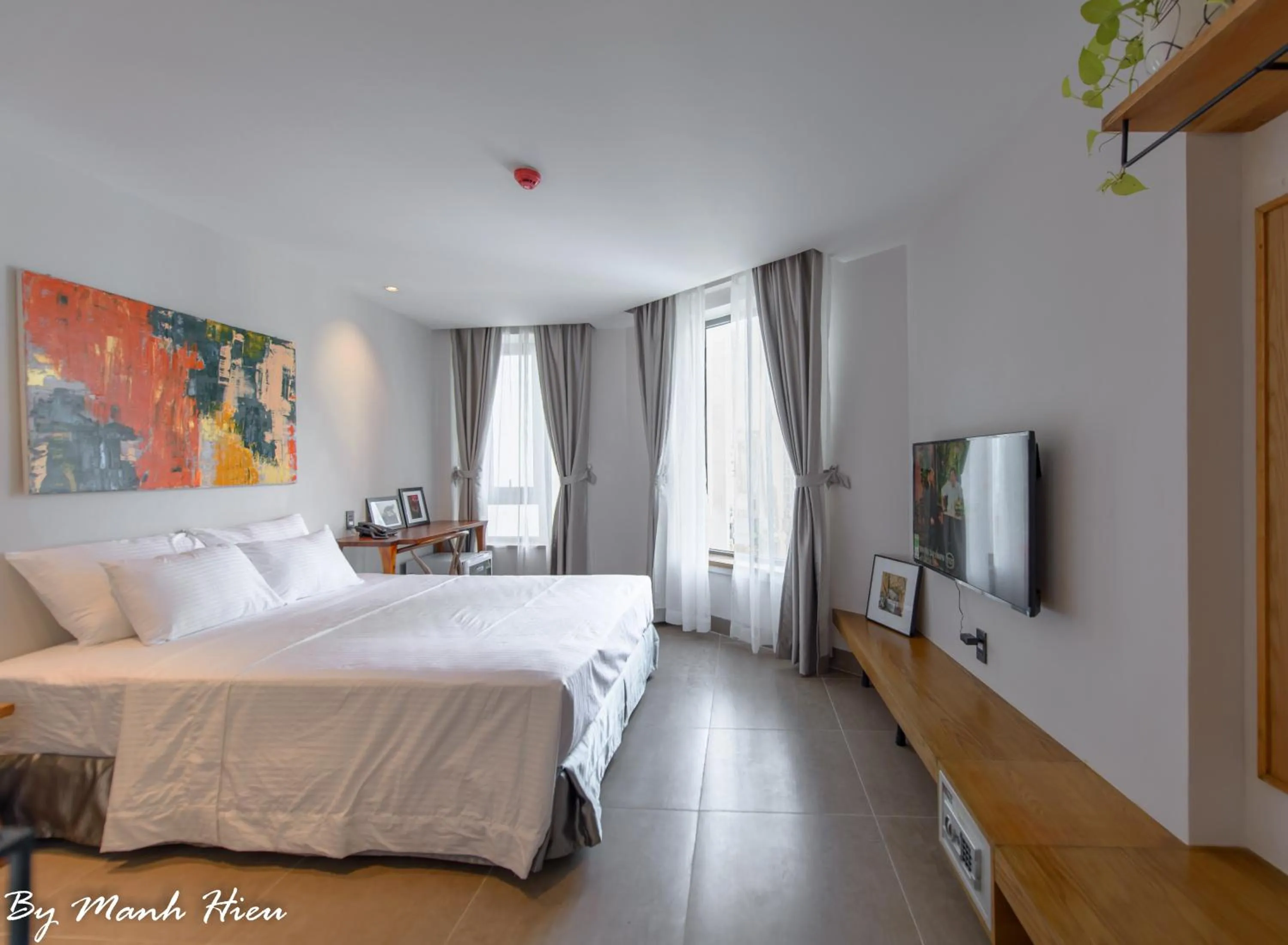 Bed in Mojzo Inn Boutique Hotel