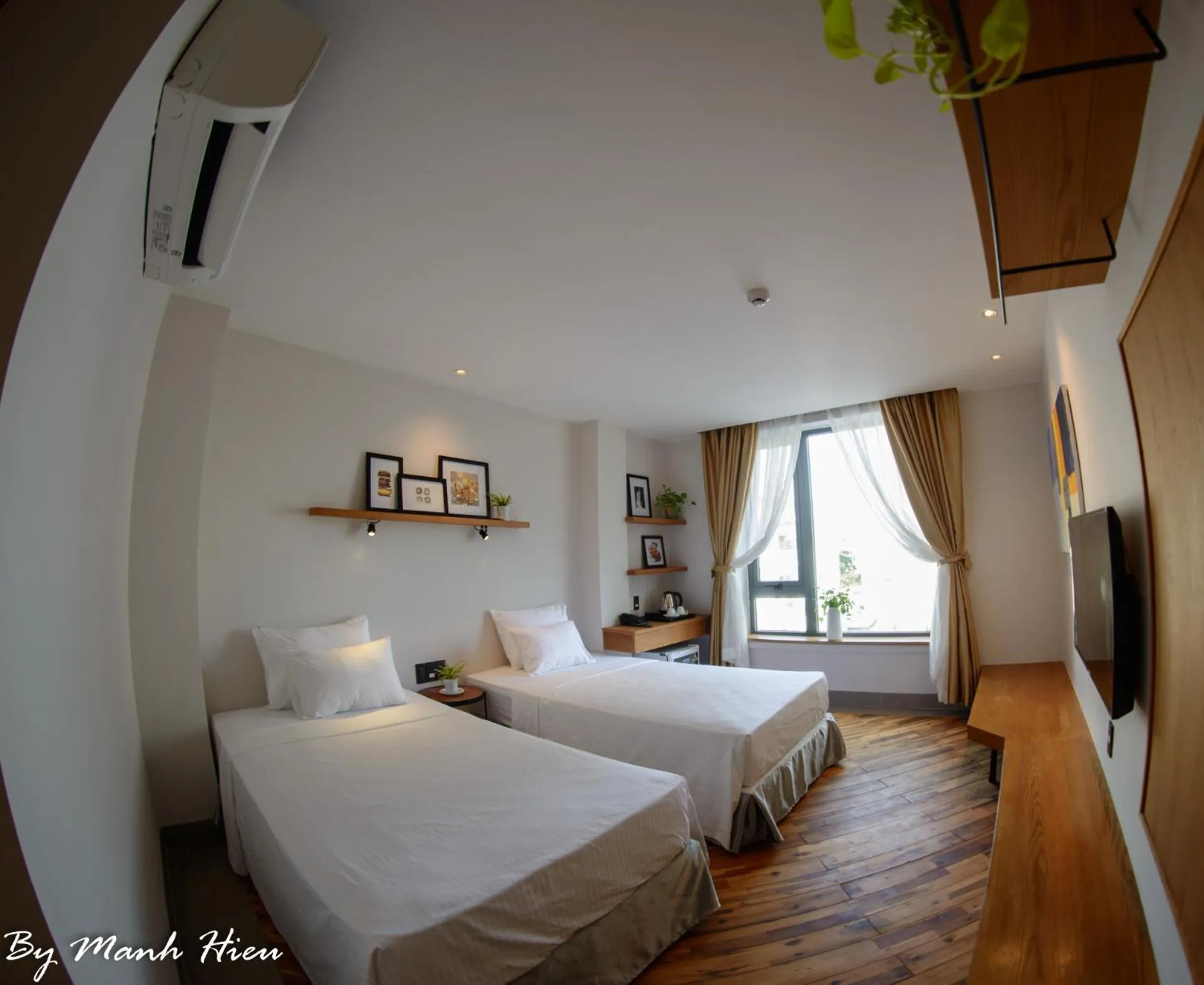 Bed in Mojzo Inn Boutique Hotel