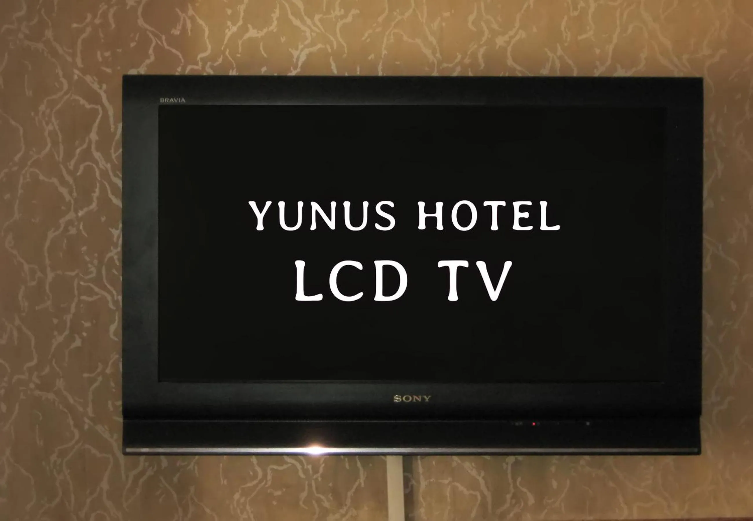 Property logo or sign in Yunus Hotel