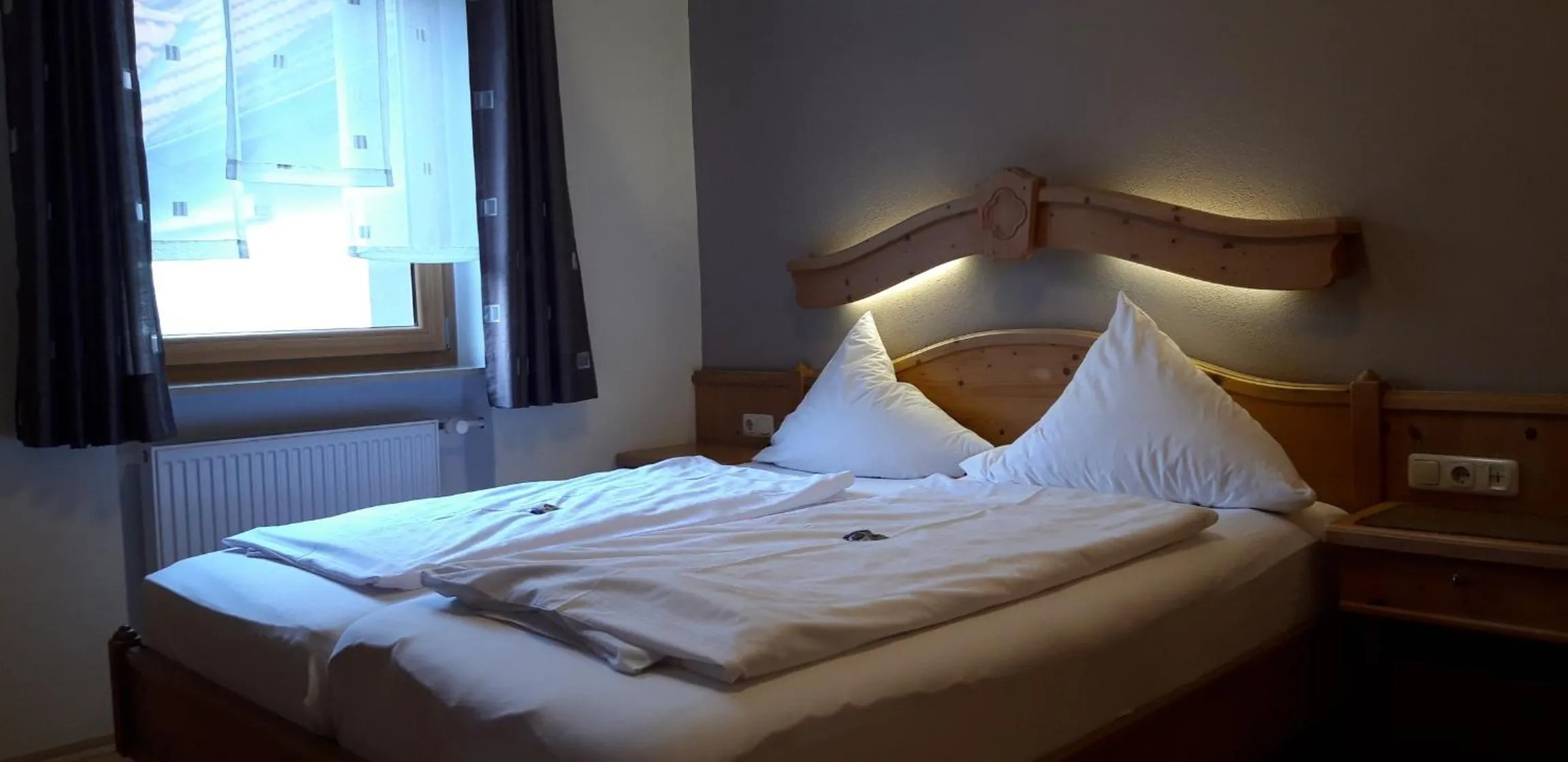 Bed in Landhotel Zum Goldenen Kreuz