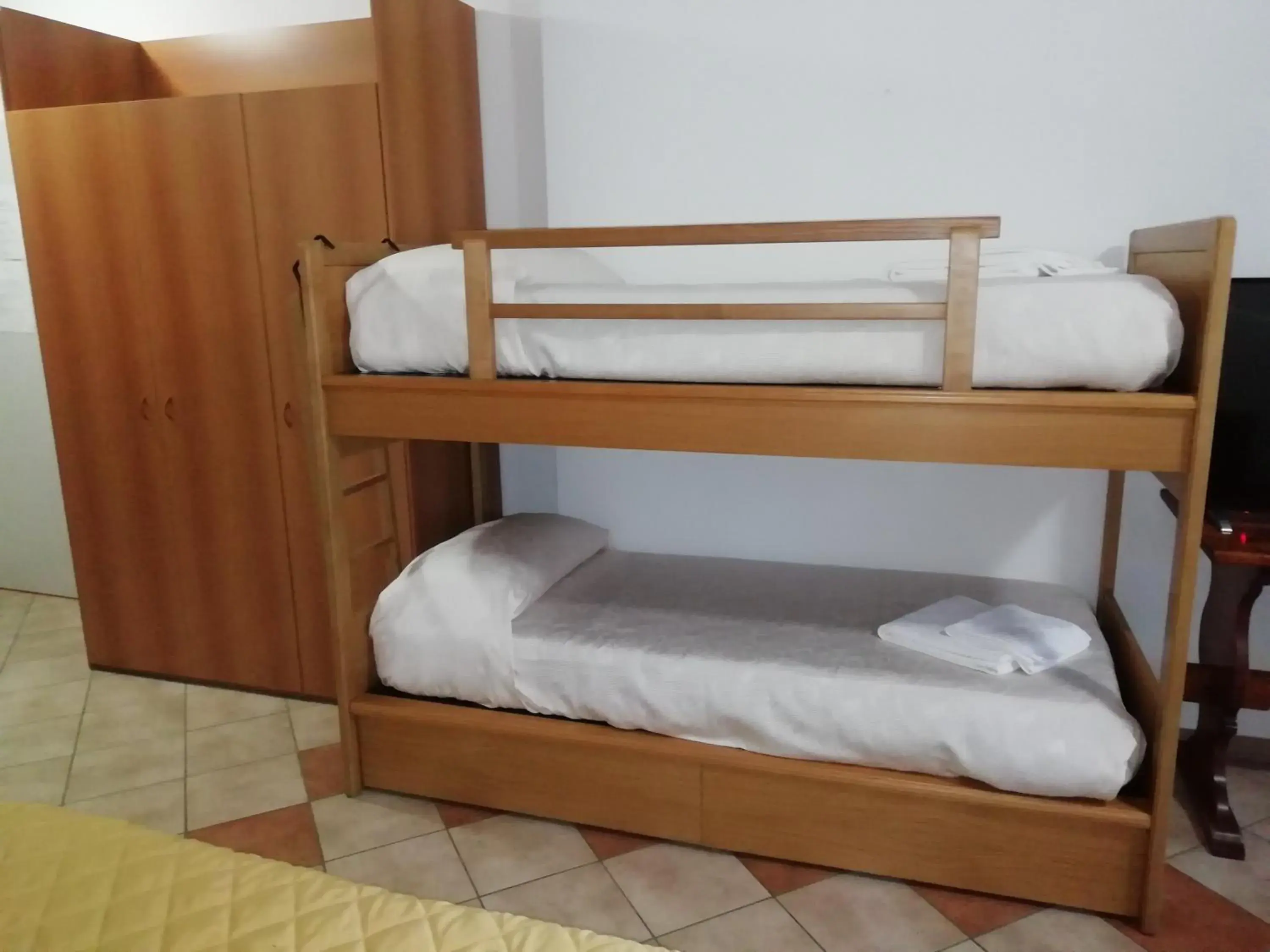 Bed in Albergo Breglia Bed in Albergo Breglia