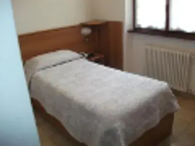 Bed in Albergo Breglia Bed in Albergo Breglia